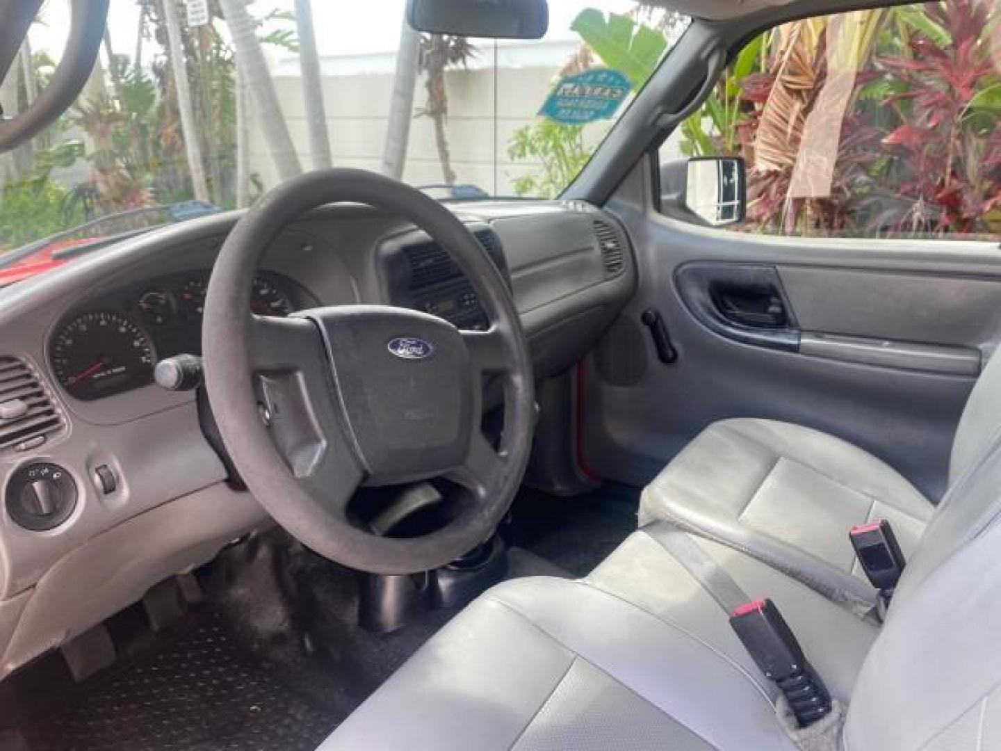 2010 Torch Red /Medium Dark Flint Ford Ranger XL LOW MILES 45,669 4 CYL 5 SPD (1FTKR1AD2AP) with an 2.3L DOHC 16-Valve I4 Engine engine, Manual transmission, located at 4701 North Dixie Hwy, Pompano Beach, FL, 33064, (954) 422-2889, 26.240938, -80.123474 - OUR WEBPAGE FLORIDACARS1.COM HAS OVER 100 PHOTOS AND FREE CARFAX LINK 2010 FORD RANGER XL VIN: 1FTKR1AD2APA10334 1 F T K R 1 A D 2 A P A 1 0 3 3 4 PICKUP 2.3L I4 F DOHC 16V GASOLINE REAR WHEEL DRIVE Features ABS Brakes Air Conditioning AM/FM Stereo Manual Transmission Side Airbags Tow Hitch Traction - Photo#36