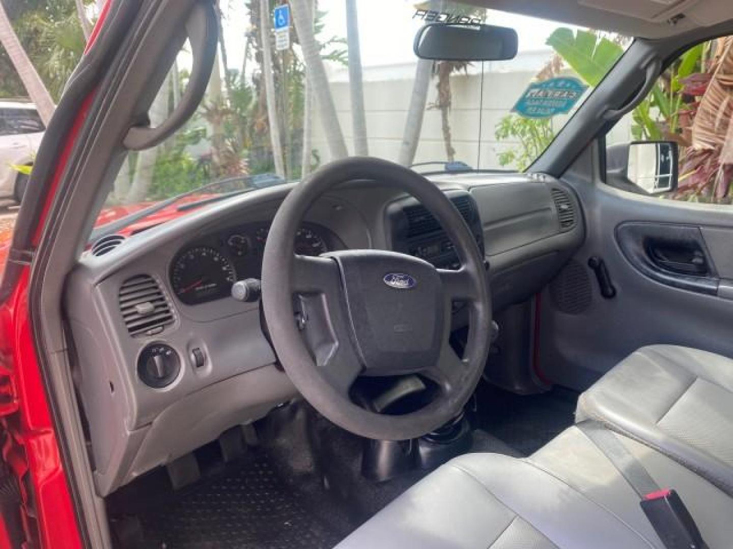 2010 Torch Red /Medium Dark Flint Ford Ranger XL LOW MILES 45,669 4 CYL 5 SPD (1FTKR1AD2AP) with an 2.3L DOHC 16-Valve I4 Engine engine, Manual transmission, located at 4701 North Dixie Hwy, Pompano Beach, FL, 33064, (954) 422-2889, 26.240938, -80.123474 - OUR WEBPAGE FLORIDACARS1.COM HAS OVER 100 PHOTOS AND FREE CARFAX LINK 2010 FORD RANGER XL VIN: 1FTKR1AD2APA10334 1 F T K R 1 A D 2 A P A 1 0 3 3 4 PICKUP 2.3L I4 F DOHC 16V GASOLINE REAR WHEEL DRIVE Features ABS Brakes Air Conditioning AM/FM Stereo Manual Transmission Side Airbags Tow Hitch Traction - Photo#37