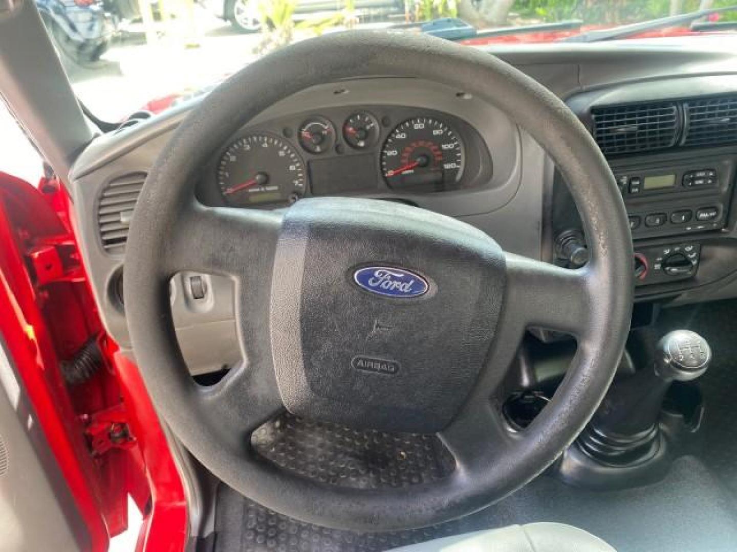 2010 Torch Red /Medium Dark Flint Ford Ranger XL LOW MILES 45,669 4 CYL 5 SPD (1FTKR1AD2AP) with an 2.3L DOHC 16-Valve I4 Engine engine, Manual transmission, located at 4701 North Dixie Hwy, Pompano Beach, FL, 33064, (954) 422-2889, 26.240938, -80.123474 - OUR WEBPAGE FLORIDACARS1.COM HAS OVER 100 PHOTOS AND FREE CARFAX LINK 2010 FORD RANGER XL VIN: 1FTKR1AD2APA10334 1 F T K R 1 A D 2 A P A 1 0 3 3 4 PICKUP 2.3L I4 F DOHC 16V GASOLINE REAR WHEEL DRIVE Features ABS Brakes Air Conditioning AM/FM Stereo Manual Transmission Side Airbags Tow Hitch Traction - Photo#39