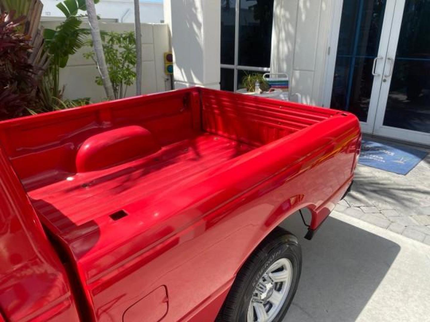 2010 Torch Red /Medium Dark Flint Ford Ranger XL LOW MILES 45,669 4 CYL 5 SPD (1FTKR1AD2AP) with an 2.3L DOHC 16-Valve I4 Engine engine, Manual transmission, located at 4701 North Dixie Hwy, Pompano Beach, FL, 33064, (954) 422-2889, 26.240938, -80.123474 - OUR WEBPAGE FLORIDACARS1.COM HAS OVER 100 PHOTOS AND FREE CARFAX LINK 2010 FORD RANGER XL VIN: 1FTKR1AD2APA10334 1 F T K R 1 A D 2 A P A 1 0 3 3 4 PICKUP 2.3L I4 F DOHC 16V GASOLINE REAR WHEEL DRIVE Features ABS Brakes Air Conditioning AM/FM Stereo Manual Transmission Side Airbags Tow Hitch Traction - Photo#61