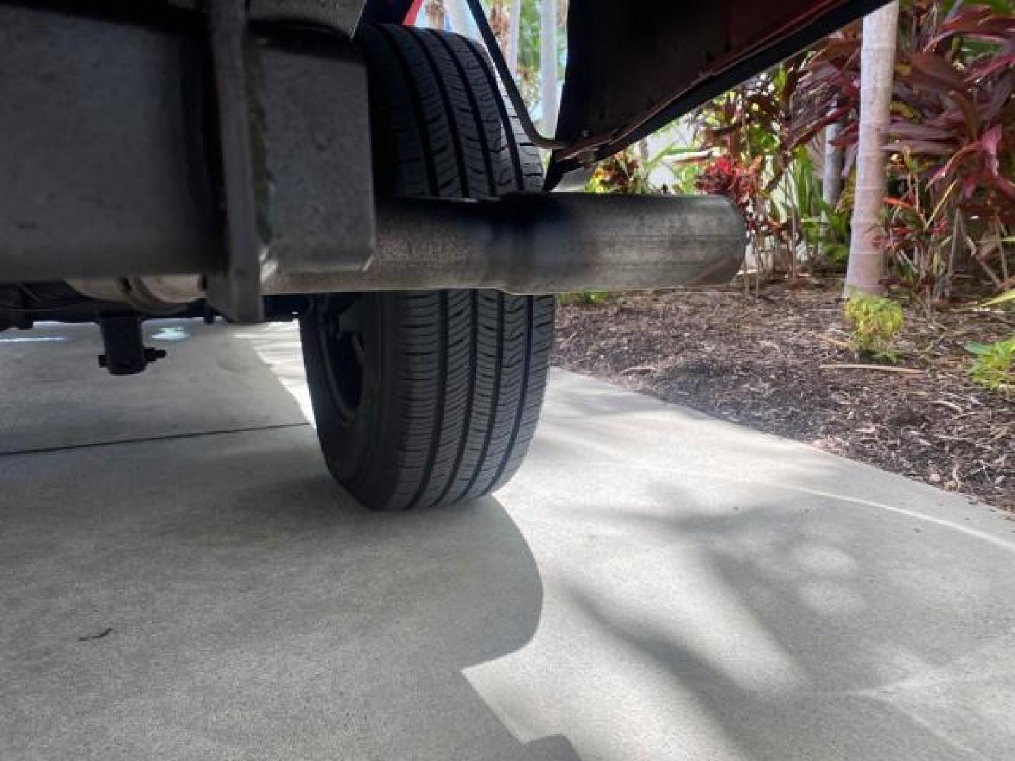 2010 Torch Red /Medium Dark Flint Ford Ranger XL LOW MILES 45,669 4 CYL 5 SPD (1FTKR1AD2AP) with an 2.3L DOHC 16-Valve I4 Engine engine, Manual transmission, located at 4701 North Dixie Hwy, Pompano Beach, FL, 33064, (954) 422-2889, 26.240938, -80.123474 - OUR WEBPAGE FLORIDACARS1.COM HAS OVER 100 PHOTOS AND FREE CARFAX LINK 2010 FORD RANGER XL VIN: 1FTKR1AD2APA10334 1 F T K R 1 A D 2 A P A 1 0 3 3 4 PICKUP 2.3L I4 F DOHC 16V GASOLINE REAR WHEEL DRIVE Features ABS Brakes Air Conditioning AM/FM Stereo Manual Transmission Side Airbags Tow Hitch Traction - Photo#79