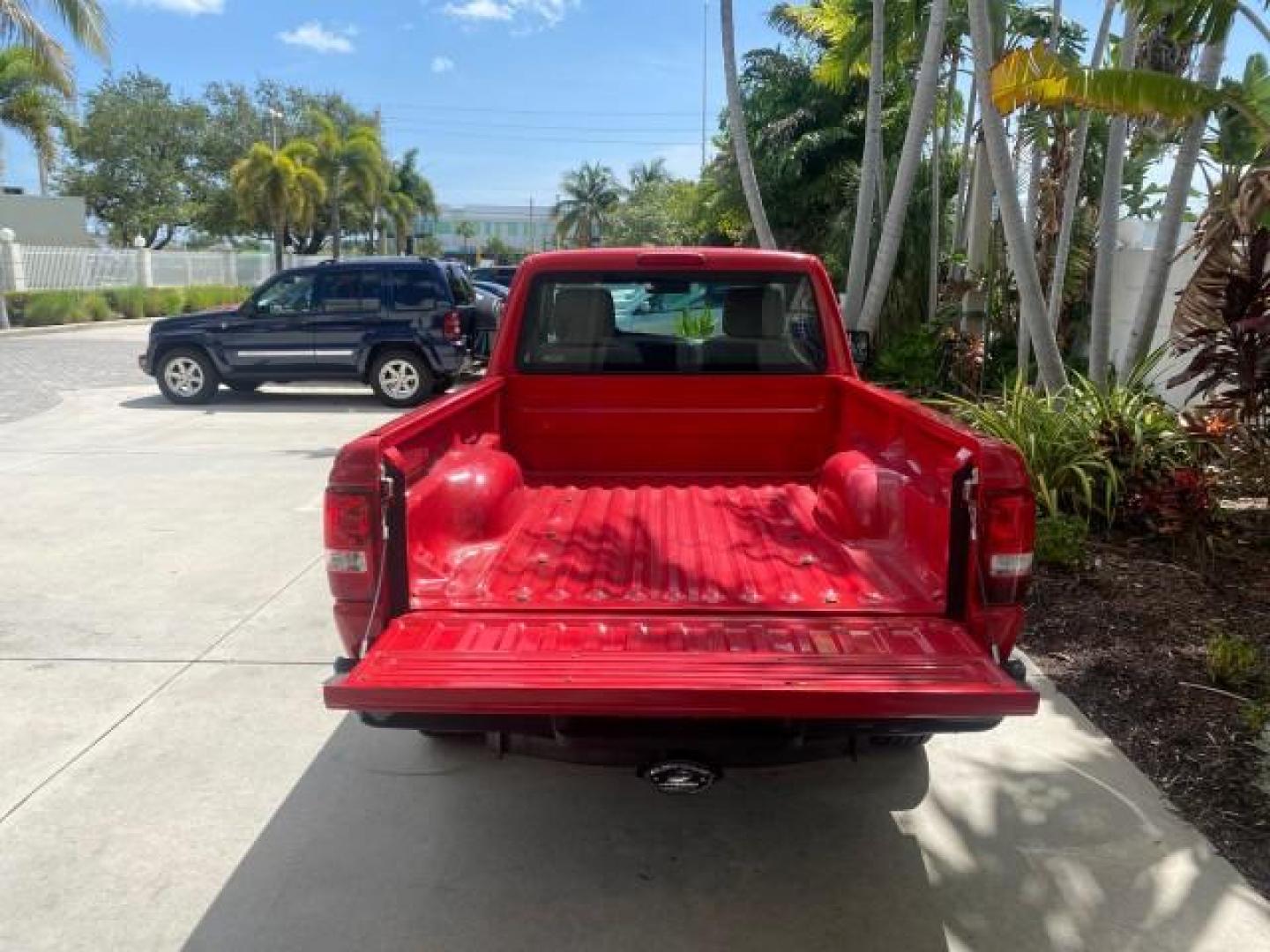 2010 Torch Red /Medium Dark Flint Ford Ranger XL LOW MILES 45,669 4 CYL 5 SPD (1FTKR1AD2AP) with an 2.3L DOHC 16-Valve I4 Engine engine, Manual transmission, located at 4701 North Dixie Hwy, Pompano Beach, FL, 33064, (954) 422-2889, 26.240938, -80.123474 - OUR WEBPAGE FLORIDACARS1.COM HAS OVER 100 PHOTOS AND FREE CARFAX LINK 2010 FORD RANGER XL VIN: 1FTKR1AD2APA10334 1 F T K R 1 A D 2 A P A 1 0 3 3 4 PICKUP 2.3L I4 F DOHC 16V GASOLINE REAR WHEEL DRIVE Features ABS Brakes Air Conditioning AM/FM Stereo Manual Transmission Side Airbags Tow Hitch Traction - Photo#80