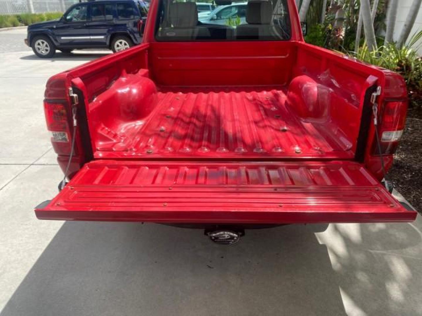 2010 Torch Red /Medium Dark Flint Ford Ranger XL LOW MILES 45,669 4 CYL 5 SPD (1FTKR1AD2AP) with an 2.3L DOHC 16-Valve I4 Engine engine, Manual transmission, located at 4701 North Dixie Hwy, Pompano Beach, FL, 33064, (954) 422-2889, 26.240938, -80.123474 - OUR WEBPAGE FLORIDACARS1.COM HAS OVER 100 PHOTOS AND FREE CARFAX LINK 2010 FORD RANGER XL VIN: 1FTKR1AD2APA10334 1 F T K R 1 A D 2 A P A 1 0 3 3 4 PICKUP 2.3L I4 F DOHC 16V GASOLINE REAR WHEEL DRIVE Features ABS Brakes Air Conditioning AM/FM Stereo Manual Transmission Side Airbags Tow Hitch Traction - Photo#81