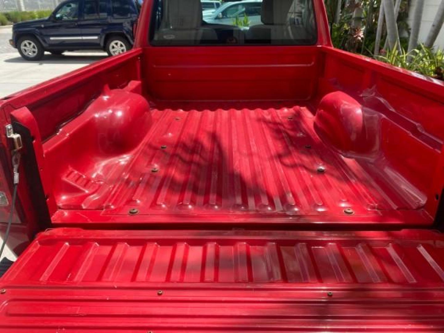 2010 Torch Red /Medium Dark Flint Ford Ranger XL LOW MILES 45,669 4 CYL 5 SPD (1FTKR1AD2AP) with an 2.3L DOHC 16-Valve I4 Engine engine, Manual transmission, located at 4701 North Dixie Hwy, Pompano Beach, FL, 33064, (954) 422-2889, 26.240938, -80.123474 - OUR WEBPAGE FLORIDACARS1.COM HAS OVER 100 PHOTOS AND FREE CARFAX LINK 2010 FORD RANGER XL VIN: 1FTKR1AD2APA10334 1 F T K R 1 A D 2 A P A 1 0 3 3 4 PICKUP 2.3L I4 F DOHC 16V GASOLINE REAR WHEEL DRIVE Features ABS Brakes Air Conditioning AM/FM Stereo Manual Transmission Side Airbags Tow Hitch Traction - Photo#82