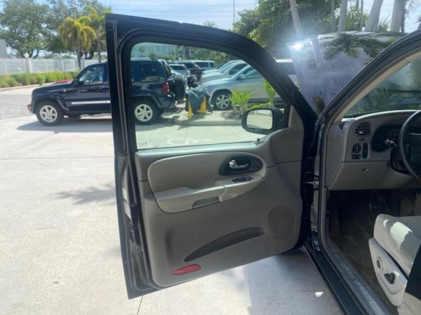 2005 Black /Light Gray Chevrolet TrailBlazer LT LOW MILES 30,654 (1GNDS13S752) with an 4.2L Vortec 4200 SFI I6 Engine engine, Automatic transmission, located at 4701 North Dixie Hwy, Pompano Beach, FL, 33064, (954) 422-2889, 26.240938, -80.123474 - OUR WEBPAGE FLORIDACARS1.COM HAS OVER 100 PHOTOS AND FREE CARFAX LINK 2005 CHEVROLET TRAILBLAZER LS VIN: 1GNDS13S752214856 4 DOOR WAGON/SPORT UTILITY 4.2L I6 F GASOLINE REAR WHEEL DRIVE Highlighted Features Alloy Wheels Automatic Climate Control Connected Car Cruise Control Dual-Zone Climate Control - Photo#9