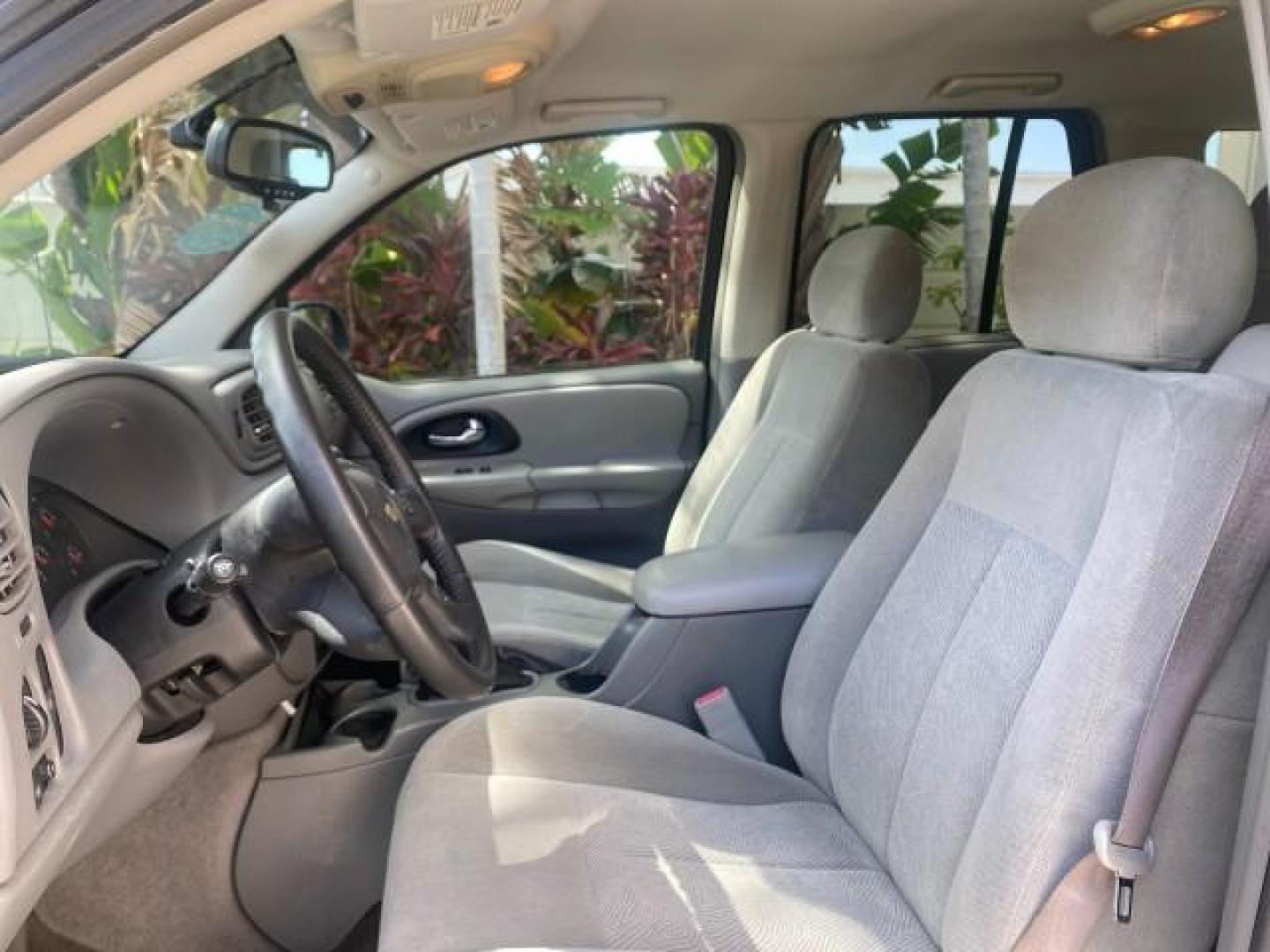 2005 Black /Light Gray Chevrolet TrailBlazer LT LOW MILES 30,654 (1GNDS13S752) with an 4.2L Vortec 4200 SFI I6 Engine engine, Automatic transmission, located at 4701 North Dixie Hwy, Pompano Beach, FL, 33064, (954) 422-2889, 26.240938, -80.123474 - OUR WEBPAGE FLORIDACARS1.COM HAS OVER 100 PHOTOS AND FREE CARFAX LINK 2005 CHEVROLET TRAILBLAZER LS VIN: 1GNDS13S752214856 4 DOOR WAGON/SPORT UTILITY 4.2L I6 F GASOLINE REAR WHEEL DRIVE Highlighted Features Alloy Wheels Automatic Climate Control Connected Car Cruise Control Dual-Zone Climate Control - Photo#10