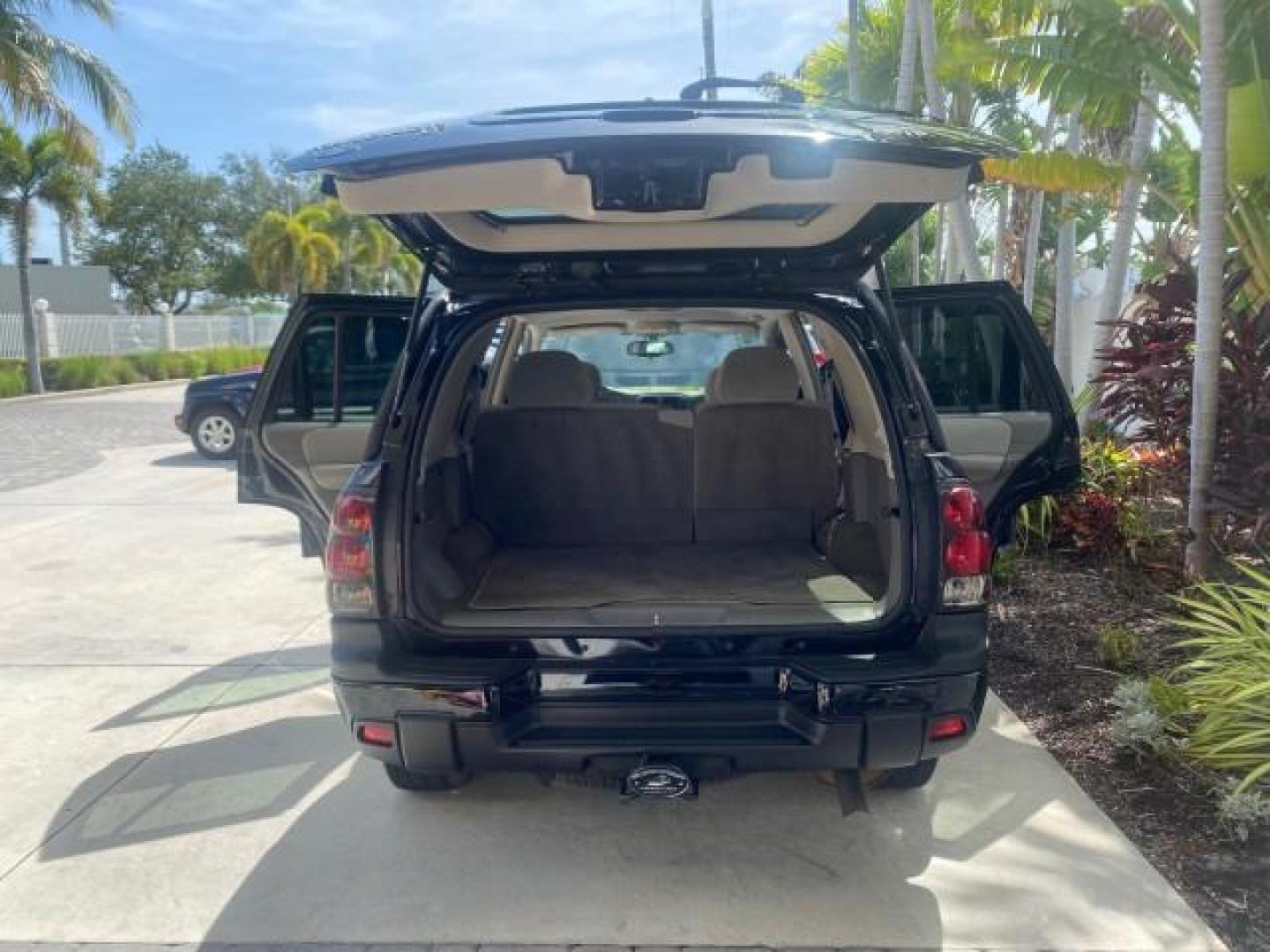 2005 Black /Light Gray Chevrolet TrailBlazer LT LOW MILES 30,654 (1GNDS13S752) with an 4.2L Vortec 4200 SFI I6 Engine engine, Automatic transmission, located at 4701 North Dixie Hwy, Pompano Beach, FL, 33064, (954) 422-2889, 26.240938, -80.123474 - OUR WEBPAGE FLORIDACARS1.COM HAS OVER 100 PHOTOS AND FREE CARFAX LINK 2005 CHEVROLET TRAILBLAZER LS VIN: 1GNDS13S752214856 4 DOOR WAGON/SPORT UTILITY 4.2L I6 F GASOLINE REAR WHEEL DRIVE Highlighted Features Alloy Wheels Automatic Climate Control Connected Car Cruise Control Dual-Zone Climate Control - Photo#15