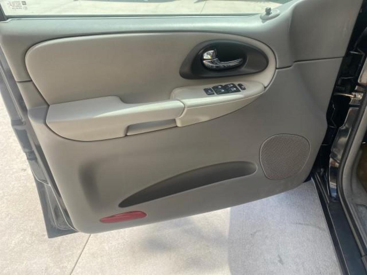 2005 Black /Light Gray Chevrolet TrailBlazer LT LOW MILES 30,654 (1GNDS13S752) with an 4.2L Vortec 4200 SFI I6 Engine engine, Automatic transmission, located at 4701 North Dixie Hwy, Pompano Beach, FL, 33064, (954) 422-2889, 26.240938, -80.123474 - OUR WEBPAGE FLORIDACARS1.COM HAS OVER 100 PHOTOS AND FREE CARFAX LINK 2005 CHEVROLET TRAILBLAZER LS VIN: 1GNDS13S752214856 4 DOOR WAGON/SPORT UTILITY 4.2L I6 F GASOLINE REAR WHEEL DRIVE Highlighted Features Alloy Wheels Automatic Climate Control Connected Car Cruise Control Dual-Zone Climate Control - Photo#31