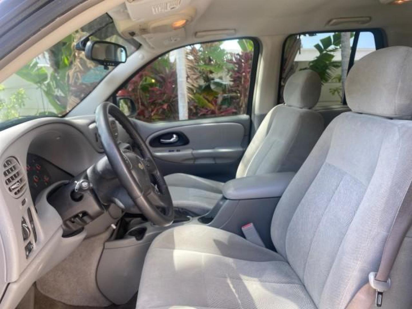 2005 Black /Light Gray Chevrolet TrailBlazer LT LOW MILES 30,654 (1GNDS13S752) with an 4.2L Vortec 4200 SFI I6 Engine engine, Automatic transmission, located at 4701 North Dixie Hwy, Pompano Beach, FL, 33064, (954) 422-2889, 26.240938, -80.123474 - OUR WEBPAGE FLORIDACARS1.COM HAS OVER 100 PHOTOS AND FREE CARFAX LINK 2005 CHEVROLET TRAILBLAZER LS VIN: 1GNDS13S752214856 4 DOOR WAGON/SPORT UTILITY 4.2L I6 F GASOLINE REAR WHEEL DRIVE Highlighted Features Alloy Wheels Automatic Climate Control Connected Car Cruise Control Dual-Zone Climate Control - Photo#32