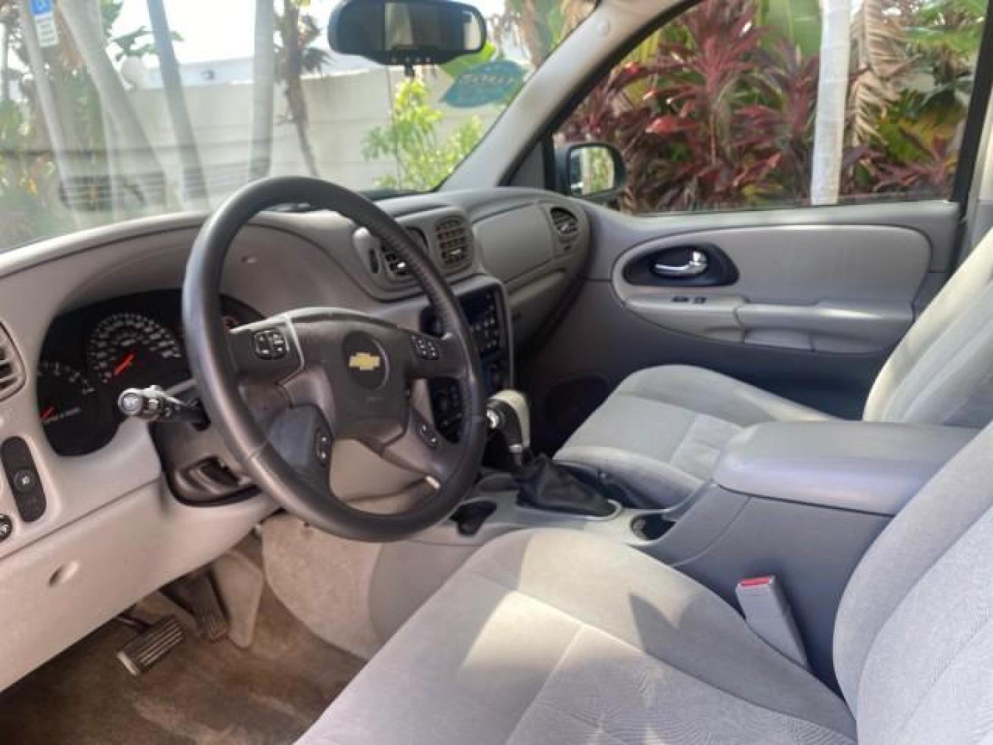 2005 Black /Light Gray Chevrolet TrailBlazer LT LOW MILES 30,654 (1GNDS13S752) with an 4.2L Vortec 4200 SFI I6 Engine engine, Automatic transmission, located at 4701 North Dixie Hwy, Pompano Beach, FL, 33064, (954) 422-2889, 26.240938, -80.123474 - OUR WEBPAGE FLORIDACARS1.COM HAS OVER 100 PHOTOS AND FREE CARFAX LINK 2005 CHEVROLET TRAILBLAZER LS VIN: 1GNDS13S752214856 4 DOOR WAGON/SPORT UTILITY 4.2L I6 F GASOLINE REAR WHEEL DRIVE Highlighted Features Alloy Wheels Automatic Climate Control Connected Car Cruise Control Dual-Zone Climate Control - Photo#34