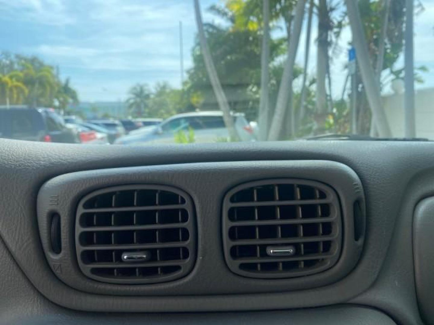 2005 Black /Light Gray Chevrolet TrailBlazer LT LOW MILES 30,654 (1GNDS13S752) with an 4.2L Vortec 4200 SFI I6 Engine engine, Automatic transmission, located at 4701 North Dixie Hwy, Pompano Beach, FL, 33064, (954) 422-2889, 26.240938, -80.123474 - OUR WEBPAGE FLORIDACARS1.COM HAS OVER 100 PHOTOS AND FREE CARFAX LINK 2005 CHEVROLET TRAILBLAZER LS VIN: 1GNDS13S752214856 4 DOOR WAGON/SPORT UTILITY 4.2L I6 F GASOLINE REAR WHEEL DRIVE Highlighted Features Alloy Wheels Automatic Climate Control Connected Car Cruise Control Dual-Zone Climate Control - Photo#44