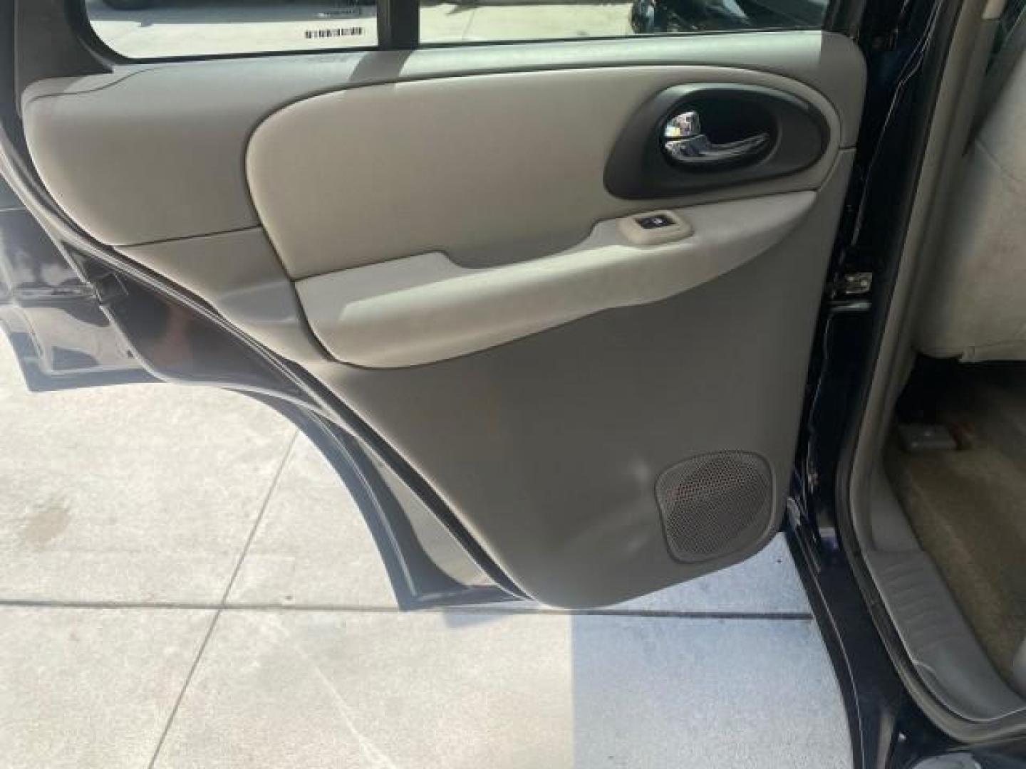 2005 Black /Light Gray Chevrolet TrailBlazer LT LOW MILES 30,654 (1GNDS13S752) with an 4.2L Vortec 4200 SFI I6 Engine engine, Automatic transmission, located at 4701 North Dixie Hwy, Pompano Beach, FL, 33064, (954) 422-2889, 26.240938, -80.123474 - OUR WEBPAGE FLORIDACARS1.COM HAS OVER 100 PHOTOS AND FREE CARFAX LINK 2005 CHEVROLET TRAILBLAZER LS VIN: 1GNDS13S752214856 4 DOOR WAGON/SPORT UTILITY 4.2L I6 F GASOLINE REAR WHEEL DRIVE Highlighted Features Alloy Wheels Automatic Climate Control Connected Car Cruise Control Dual-Zone Climate Control - Photo#59