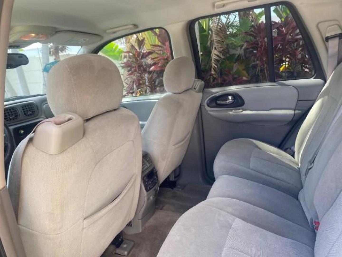 2005 Black /Light Gray Chevrolet TrailBlazer LT LOW MILES 30,654 (1GNDS13S752) with an 4.2L Vortec 4200 SFI I6 Engine engine, Automatic transmission, located at 4701 North Dixie Hwy, Pompano Beach, FL, 33064, (954) 422-2889, 26.240938, -80.123474 - OUR WEBPAGE FLORIDACARS1.COM HAS OVER 100 PHOTOS AND FREE CARFAX LINK 2005 CHEVROLET TRAILBLAZER LS VIN: 1GNDS13S752214856 4 DOOR WAGON/SPORT UTILITY 4.2L I6 F GASOLINE REAR WHEEL DRIVE Highlighted Features Alloy Wheels Automatic Climate Control Connected Car Cruise Control Dual-Zone Climate Control - Photo#63