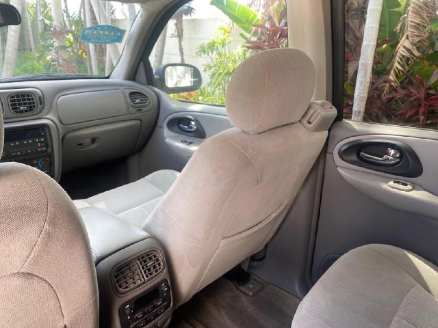 2005 Black /Light Gray Chevrolet TrailBlazer LT LOW MILES 30,654 (1GNDS13S752) with an 4.2L Vortec 4200 SFI I6 Engine engine, Automatic transmission, located at 4701 North Dixie Hwy, Pompano Beach, FL, 33064, (954) 422-2889, 26.240938, -80.123474 - OUR WEBPAGE FLORIDACARS1.COM HAS OVER 100 PHOTOS AND FREE CARFAX LINK 2005 CHEVROLET TRAILBLAZER LS VIN: 1GNDS13S752214856 4 DOOR WAGON/SPORT UTILITY 4.2L I6 F GASOLINE REAR WHEEL DRIVE Highlighted Features Alloy Wheels Automatic Climate Control Connected Car Cruise Control Dual-Zone Climate Control - Photo#68
