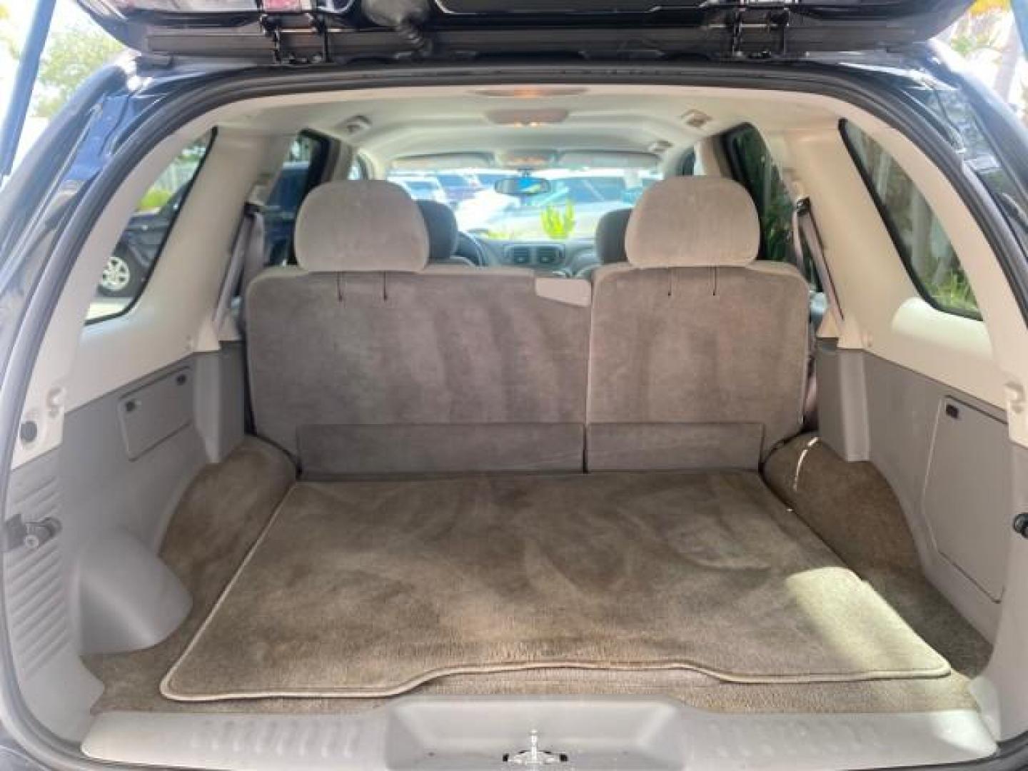 2005 Black /Light Gray Chevrolet TrailBlazer LT LOW MILES 30,654 (1GNDS13S752) with an 4.2L Vortec 4200 SFI I6 Engine engine, Automatic transmission, located at 4701 North Dixie Hwy, Pompano Beach, FL, 33064, (954) 422-2889, 26.240938, -80.123474 - OUR WEBPAGE FLORIDACARS1.COM HAS OVER 100 PHOTOS AND FREE CARFAX LINK 2005 CHEVROLET TRAILBLAZER LS VIN: 1GNDS13S752214856 4 DOOR WAGON/SPORT UTILITY 4.2L I6 F GASOLINE REAR WHEEL DRIVE Highlighted Features Alloy Wheels Automatic Climate Control Connected Car Cruise Control Dual-Zone Climate Control - Photo#81