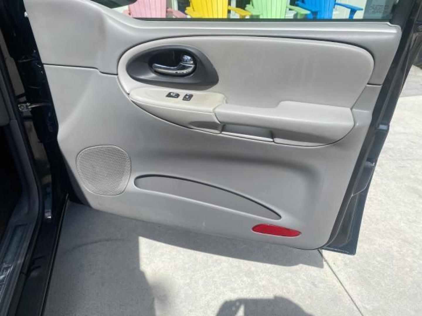 2005 Black /Light Gray Chevrolet TrailBlazer LT LOW MILES 30,654 (1GNDS13S752) with an 4.2L Vortec 4200 SFI I6 Engine engine, Automatic transmission, located at 4701 North Dixie Hwy, Pompano Beach, FL, 33064, (954) 422-2889, 26.240938, -80.123474 - OUR WEBPAGE FLORIDACARS1.COM HAS OVER 100 PHOTOS AND FREE CARFAX LINK 2005 CHEVROLET TRAILBLAZER LS VIN: 1GNDS13S752214856 4 DOOR WAGON/SPORT UTILITY 4.2L I6 F GASOLINE REAR WHEEL DRIVE Highlighted Features Alloy Wheels Automatic Climate Control Connected Car Cruise Control Dual-Zone Climate Control - Photo#96