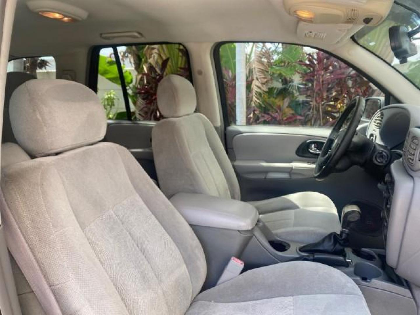 2005 Black /Light Gray Chevrolet TrailBlazer LT LOW MILES 30,654 (1GNDS13S752) with an 4.2L Vortec 4200 SFI I6 Engine engine, Automatic transmission, located at 4701 North Dixie Hwy, Pompano Beach, FL, 33064, (954) 422-2889, 26.240938, -80.123474 - OUR WEBPAGE FLORIDACARS1.COM HAS OVER 100 PHOTOS AND FREE CARFAX LINK 2005 CHEVROLET TRAILBLAZER LS VIN: 1GNDS13S752214856 4 DOOR WAGON/SPORT UTILITY 4.2L I6 F GASOLINE REAR WHEEL DRIVE Highlighted Features Alloy Wheels Automatic Climate Control Connected Car Cruise Control Dual-Zone Climate Control - Photo#97