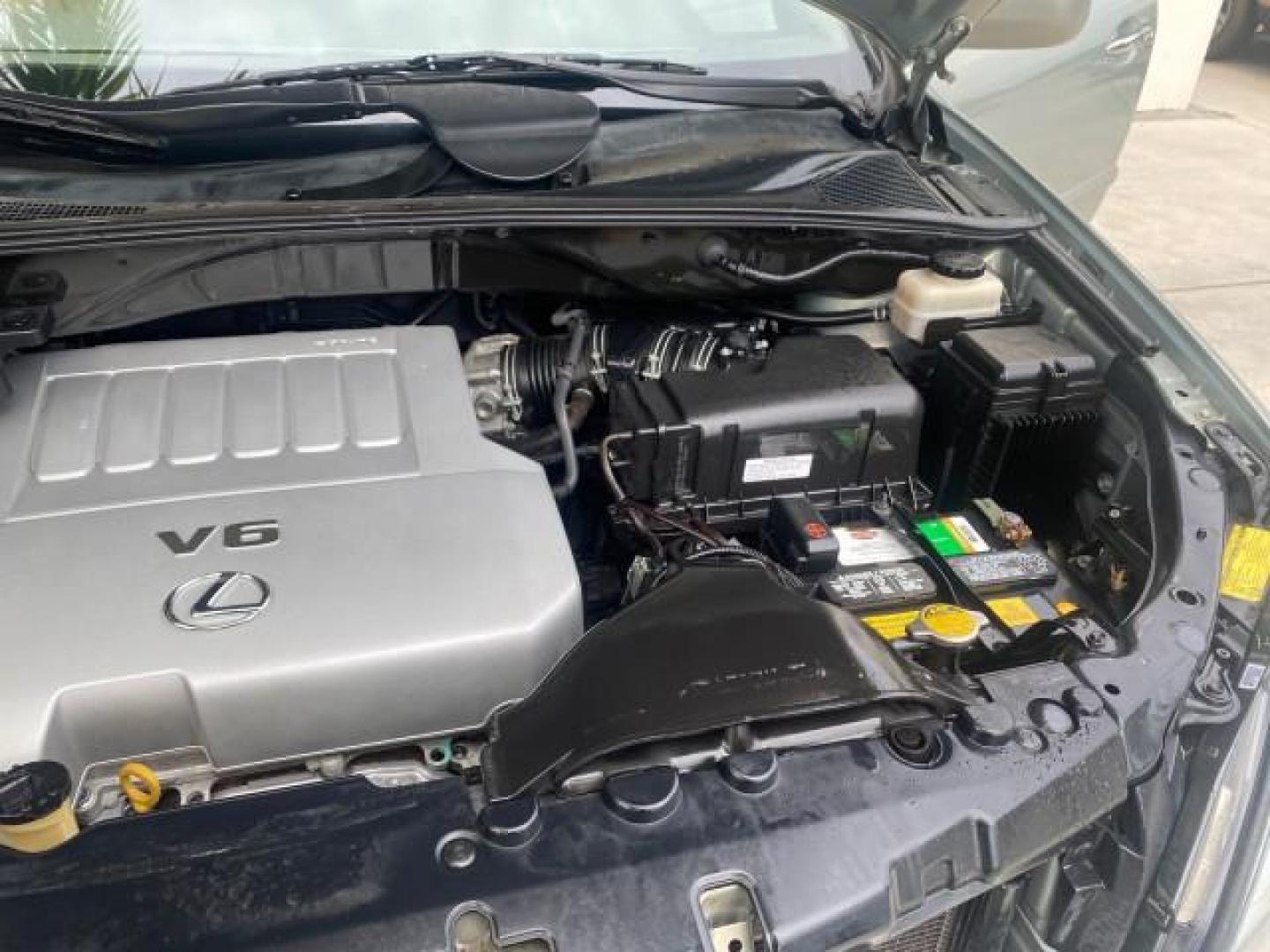 2008 Millennium Silver Metallic /Light Gray Lexus RX 350 LOW MILES SUNROOF NON SMOKERS (2T2GK31U68C) with an 3.5L DOHC SFI 24-Valve V6 Engine engine, Automatic transmission, located at 4701 North Dixie Hwy, Pompano Beach, FL, 33064, (954) 422-2889, 26.240938, -80.123474 - OUR WEBPAGE FLORIDACARS1.COM HAS OVER 100 PHOTOS AND FREE CARFAX LINK 2008 LEXUS RX 350 VIN: 2T2GK31U68C043234 2 T 2 G K 3 1 U 6 8 C 0 4 3 2 3 4 4 DOOR WAGON/SPORT UTILITY 3.5L V6 F DOHC 24V GASOLINE FRONT WHEEL DRIVE Features ABS Brakes Air Conditioning Alloy Wheels AM/FM Stereo Automatic Transmiss - Photo#25
