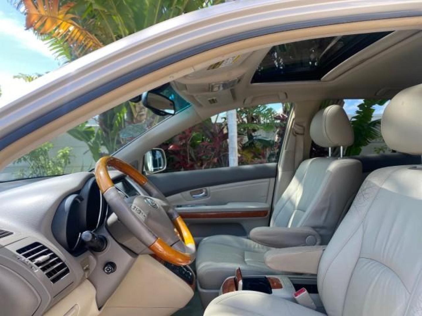 2004 Savannah Metallic /Ivory Lexus RX 330 LOW MILES 69,822 1 FL 2WD (JTJGA31U040) with an 3.3L DOHC MPI 24-Valve V6 Engine engine, Automatic transmission, located at 4701 North Dixie Hwy, Pompano Beach, FL, 33064, (954) 422-2889, 26.240938, -80.123474 - OUR WEBPAGE FLORIDACARS1.COM HAS OVER 100 PHOTOS AND FREE CARFAX LINK 2004 LEXUS RX 330 VIN: JTJGA31U040004194 J T J G A 3 1 U 0 4 0 0 0 4 1 9 4 4 DOOR WAGON/SPORT UTILITY 3.3L V6 F 24V GASOLINE FRONT WHEEL DRIVE Features ABS Brakes Air Conditioning Alloy Wheels AM/FM Stereo Automatic Transmission C - Photo#34