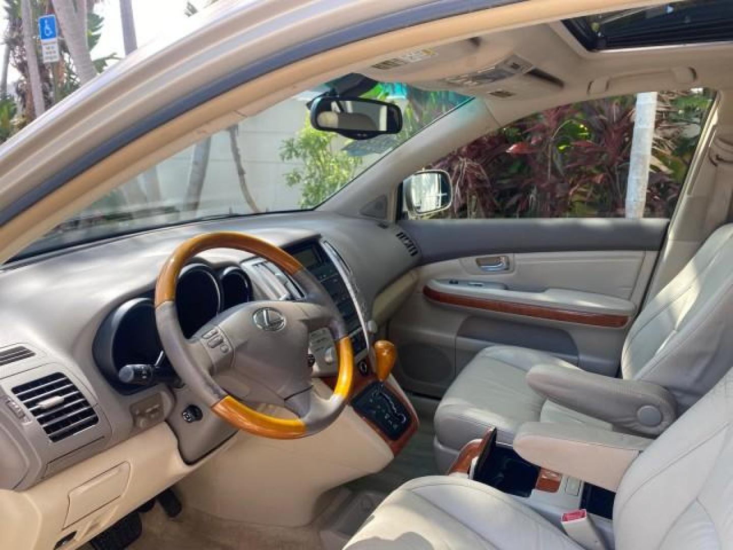2004 Savannah Metallic /Ivory Lexus RX 330 LOW MILES 69,822 1 FL 2WD (JTJGA31U040) with an 3.3L DOHC MPI 24-Valve V6 Engine engine, Automatic transmission, located at 4701 North Dixie Hwy, Pompano Beach, FL, 33064, (954) 422-2889, 26.240938, -80.123474 - OUR WEBPAGE FLORIDACARS1.COM HAS OVER 100 PHOTOS AND FREE CARFAX LINK 2004 LEXUS RX 330 VIN: JTJGA31U040004194 J T J G A 3 1 U 0 4 0 0 0 4 1 9 4 4 DOOR WAGON/SPORT UTILITY 3.3L V6 F 24V GASOLINE FRONT WHEEL DRIVE Features ABS Brakes Air Conditioning Alloy Wheels AM/FM Stereo Automatic Transmission C - Photo#35