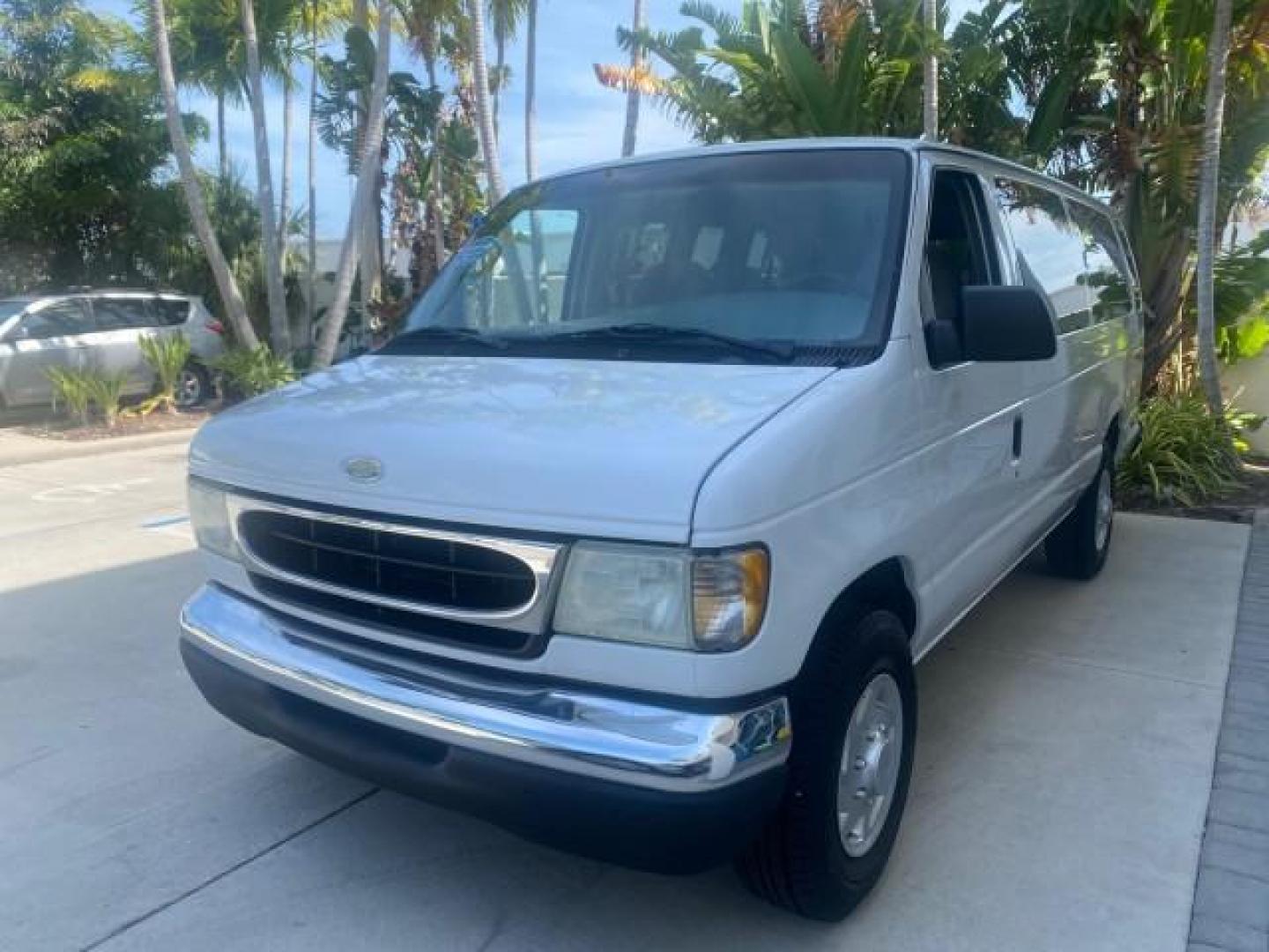 2002 Oxford White /Medium Graphite Ford Econoline Wagon XLT 15 PASSENGER FLORIDA (1FBSS31L32H) with an 5.4L EFI OHC V8 Engine engine, Automatic transmission, located at 4701 North Dixie Hwy, Pompano Beach, FL, 33064, (954) 422-2889, 26.240938, -80.123474 - OUR WEBPAGE FLORIDACARS1.COM HAS OVER 100 PHOTOS AND FREE CARFAX LINK 2002 FORD E-SERIES E-350 SD XLT VIN: 1FBSS31L32HA48789 1 F B S S 3 1 L 3 2 H A 4 8 7 8 9 VAN 5.4L V8 F SOHC 16V GASOLINE REAR WHEEL DRIVE Top Features Cloth Seats Rear Air Conditioning Third Row Seat Tow Hitch Basic Features ABS B - Photo#3