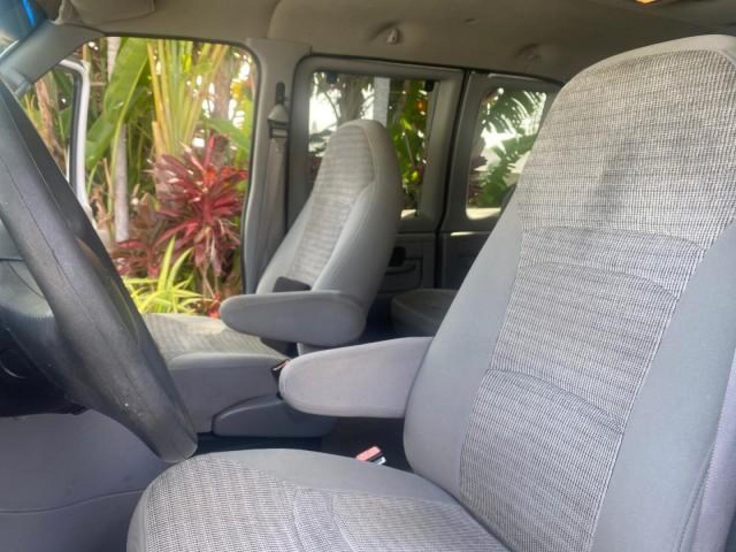 2002 Oxford White /Medium Graphite Ford Econoline Wagon XLT 15 PASSENGER FLORIDA (1FBSS31L32H) with an 5.4L EFI OHC V8 Engine engine, Automatic transmission, located at 4701 North Dixie Hwy, Pompano Beach, FL, 33064, (954) 422-2889, 26.240938, -80.123474 - OUR WEBPAGE FLORIDACARS1.COM HAS OVER 100 PHOTOS AND FREE CARFAX LINK 2002 FORD E-SERIES E-350 SD XLT VIN: 1FBSS31L32HA48789 1 F B S S 3 1 L 3 2 H A 4 8 7 8 9 VAN 5.4L V8 F SOHC 16V GASOLINE REAR WHEEL DRIVE Top Features Cloth Seats Rear Air Conditioning Third Row Seat Tow Hitch Basic Features ABS B - Photo#10