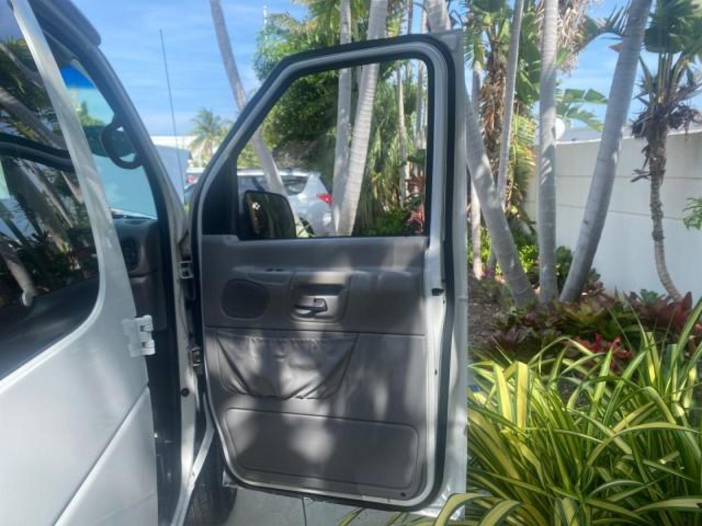 2002 Oxford White /Medium Graphite Ford Econoline Wagon XLT 15 PASSENGER FLORIDA (1FBSS31L32H) with an 5.4L EFI OHC V8 Engine engine, Automatic transmission, located at 4701 North Dixie Hwy, Pompano Beach, FL, 33064, (954) 422-2889, 26.240938, -80.123474 - OUR WEBPAGE FLORIDACARS1.COM HAS OVER 100 PHOTOS AND FREE CARFAX LINK 2002 FORD E-SERIES E-350 SD XLT VIN: 1FBSS31L32HA48789 1 F B S S 3 1 L 3 2 H A 4 8 7 8 9 VAN 5.4L V8 F SOHC 16V GASOLINE REAR WHEEL DRIVE Top Features Cloth Seats Rear Air Conditioning Third Row Seat Tow Hitch Basic Features ABS B - Photo#11