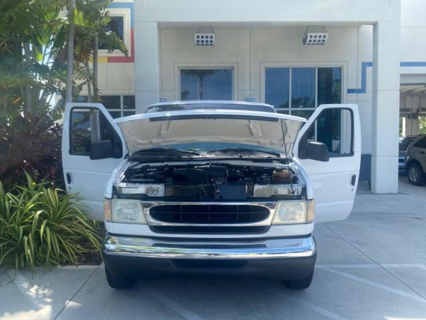 2002 Oxford White /Medium Graphite Ford Econoline Wagon XLT 15 PASSENGER FLORIDA (1FBSS31L32H) with an 5.4L EFI OHC V8 Engine engine, Automatic transmission, located at 4701 North Dixie Hwy, Pompano Beach, FL, 33064, (954) 422-2889, 26.240938, -80.123474 - OUR WEBPAGE FLORIDACARS1.COM HAS OVER 100 PHOTOS AND FREE CARFAX LINK 2002 FORD E-SERIES E-350 SD XLT VIN: 1FBSS31L32HA48789 1 F B S S 3 1 L 3 2 H A 4 8 7 8 9 VAN 5.4L V8 F SOHC 16V GASOLINE REAR WHEEL DRIVE Top Features Cloth Seats Rear Air Conditioning Third Row Seat Tow Hitch Basic Features ABS B - Photo#16
