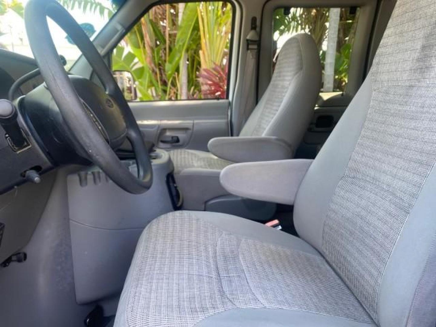 2002 Oxford White /Medium Graphite Ford Econoline Wagon XLT 15 PASSENGER FLORIDA (1FBSS31L32H) with an 5.4L EFI OHC V8 Engine engine, Automatic transmission, located at 4701 North Dixie Hwy, Pompano Beach, FL, 33064, (954) 422-2889, 26.240938, -80.123474 - OUR WEBPAGE FLORIDACARS1.COM HAS OVER 100 PHOTOS AND FREE CARFAX LINK 2002 FORD E-SERIES E-350 SD XLT VIN: 1FBSS31L32HA48789 1 F B S S 3 1 L 3 2 H A 4 8 7 8 9 VAN 5.4L V8 F SOHC 16V GASOLINE REAR WHEEL DRIVE Top Features Cloth Seats Rear Air Conditioning Third Row Seat Tow Hitch Basic Features ABS B - Photo#33