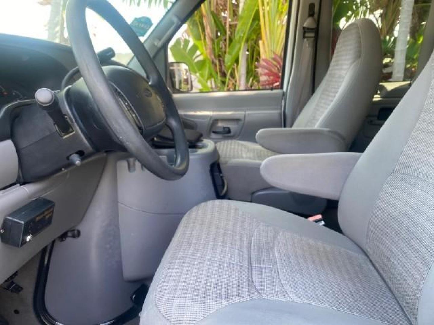 2002 Oxford White /Medium Graphite Ford Econoline Wagon XLT 15 PASSENGER FLORIDA (1FBSS31L32H) with an 5.4L EFI OHC V8 Engine engine, Automatic transmission, located at 4701 North Dixie Hwy, Pompano Beach, FL, 33064, (954) 422-2889, 26.240938, -80.123474 - OUR WEBPAGE FLORIDACARS1.COM HAS OVER 100 PHOTOS AND FREE CARFAX LINK 2002 FORD E-SERIES E-350 SD XLT VIN: 1FBSS31L32HA48789 1 F B S S 3 1 L 3 2 H A 4 8 7 8 9 VAN 5.4L V8 F SOHC 16V GASOLINE REAR WHEEL DRIVE Top Features Cloth Seats Rear Air Conditioning Third Row Seat Tow Hitch Basic Features ABS B - Photo#34