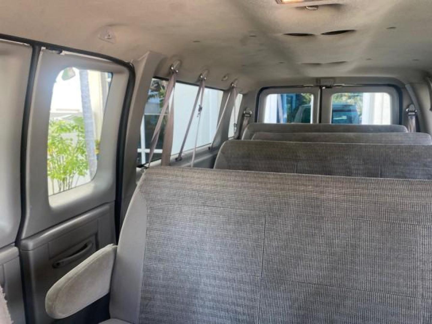 2002 Oxford White /Medium Graphite Ford Econoline Wagon XLT 15 PASSENGER FLORIDA (1FBSS31L32H) with an 5.4L EFI OHC V8 Engine engine, Automatic transmission, located at 4701 North Dixie Hwy, Pompano Beach, FL, 33064, (954) 422-2889, 26.240938, -80.123474 - OUR WEBPAGE FLORIDACARS1.COM HAS OVER 100 PHOTOS AND FREE CARFAX LINK 2002 FORD E-SERIES E-350 SD XLT VIN: 1FBSS31L32HA48789 1 F B S S 3 1 L 3 2 H A 4 8 7 8 9 VAN 5.4L V8 F SOHC 16V GASOLINE REAR WHEEL DRIVE Top Features Cloth Seats Rear Air Conditioning Third Row Seat Tow Hitch Basic Features ABS B - Photo#57
