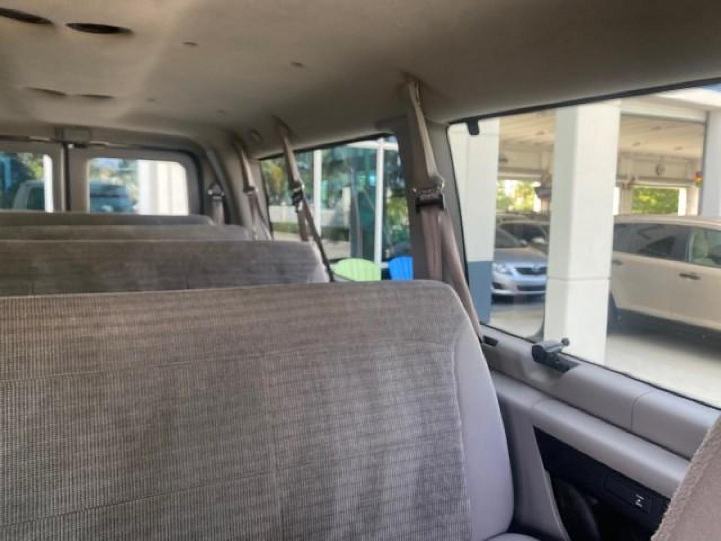 2002 Oxford White /Medium Graphite Ford Econoline Wagon XLT 15 PASSENGER FLORIDA (1FBSS31L32H) with an 5.4L EFI OHC V8 Engine engine, Automatic transmission, located at 4701 North Dixie Hwy, Pompano Beach, FL, 33064, (954) 422-2889, 26.240938, -80.123474 - OUR WEBPAGE FLORIDACARS1.COM HAS OVER 100 PHOTOS AND FREE CARFAX LINK 2002 FORD E-SERIES E-350 SD XLT VIN: 1FBSS31L32HA48789 1 F B S S 3 1 L 3 2 H A 4 8 7 8 9 VAN 5.4L V8 F SOHC 16V GASOLINE REAR WHEEL DRIVE Top Features Cloth Seats Rear Air Conditioning Third Row Seat Tow Hitch Basic Features ABS B - Photo#58
