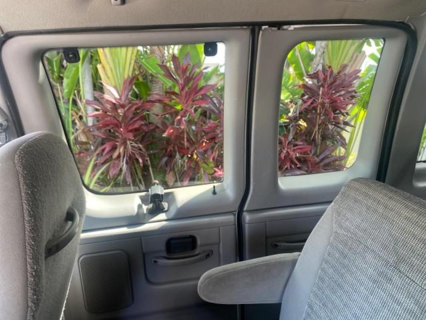 2002 Oxford White /Medium Graphite Ford Econoline Wagon XLT 15 PASSENGER FLORIDA (1FBSS31L32H) with an 5.4L EFI OHC V8 Engine engine, Automatic transmission, located at 4701 North Dixie Hwy, Pompano Beach, FL, 33064, (954) 422-2889, 26.240938, -80.123474 - OUR WEBPAGE FLORIDACARS1.COM HAS OVER 100 PHOTOS AND FREE CARFAX LINK 2002 FORD E-SERIES E-350 SD XLT VIN: 1FBSS31L32HA48789 1 F B S S 3 1 L 3 2 H A 4 8 7 8 9 VAN 5.4L V8 F SOHC 16V GASOLINE REAR WHEEL DRIVE Top Features Cloth Seats Rear Air Conditioning Third Row Seat Tow Hitch Basic Features ABS B - Photo#59