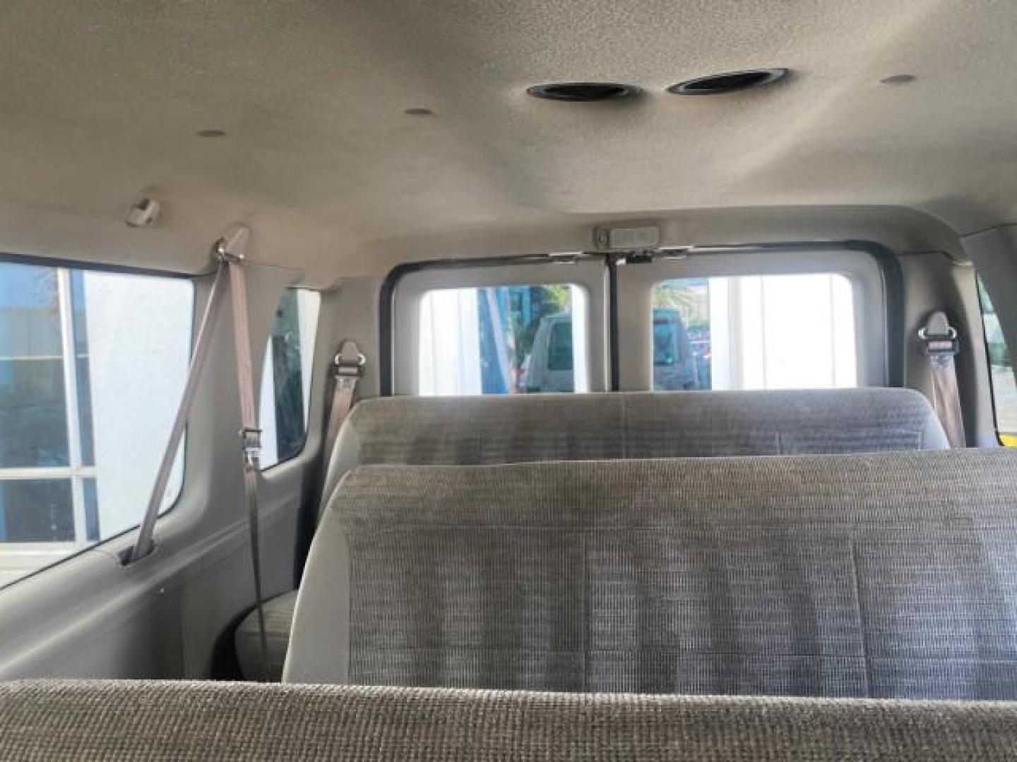 2002 Oxford White /Medium Graphite Ford Econoline Wagon XLT 15 PASSENGER FLORIDA (1FBSS31L32H) with an 5.4L EFI OHC V8 Engine engine, Automatic transmission, located at 4701 North Dixie Hwy, Pompano Beach, FL, 33064, (954) 422-2889, 26.240938, -80.123474 - OUR WEBPAGE FLORIDACARS1.COM HAS OVER 100 PHOTOS AND FREE CARFAX LINK 2002 FORD E-SERIES E-350 SD XLT VIN: 1FBSS31L32HA48789 1 F B S S 3 1 L 3 2 H A 4 8 7 8 9 VAN 5.4L V8 F SOHC 16V GASOLINE REAR WHEEL DRIVE Top Features Cloth Seats Rear Air Conditioning Third Row Seat Tow Hitch Basic Features ABS B - Photo#64