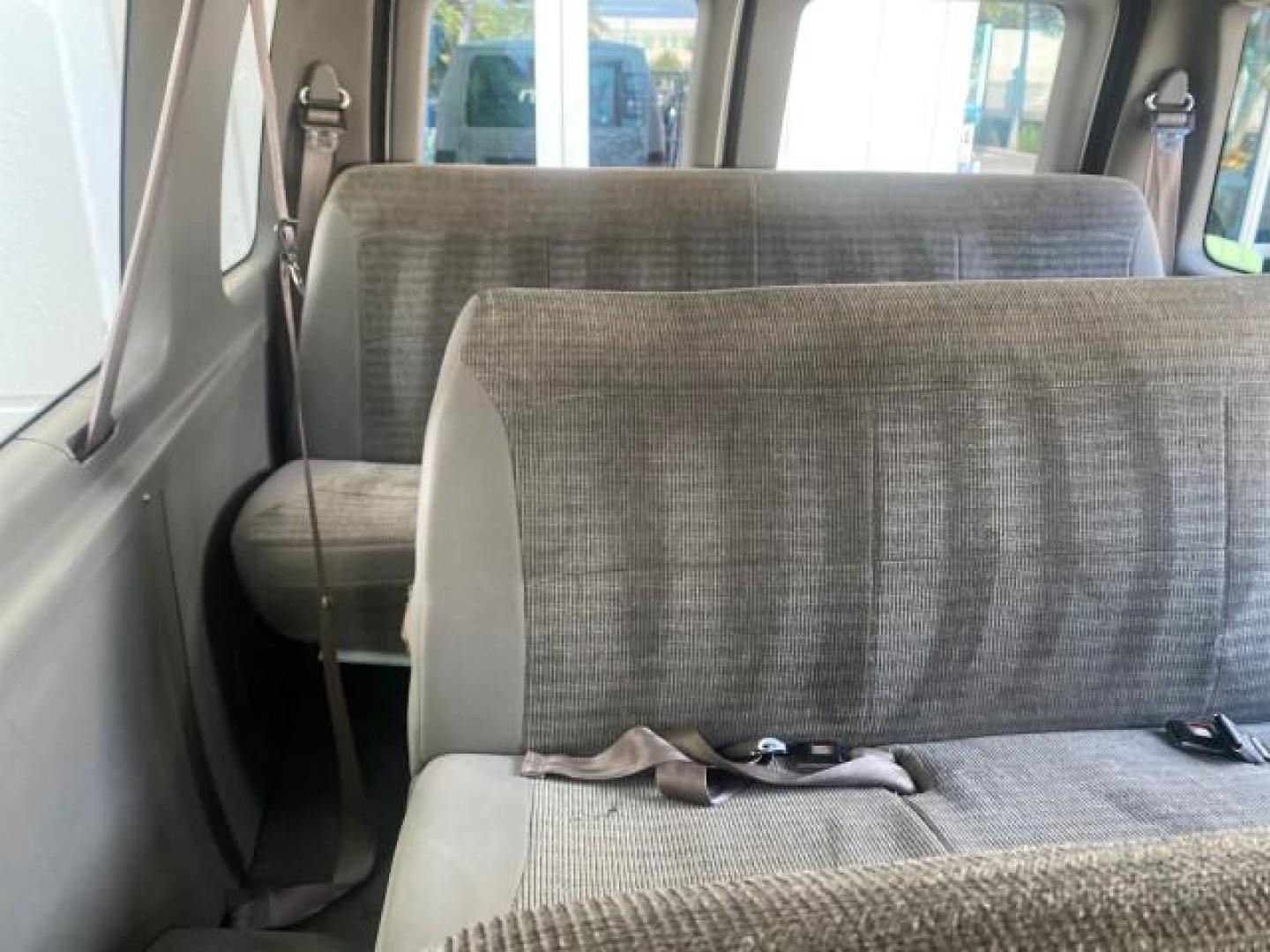 2002 Oxford White /Medium Graphite Ford Econoline Wagon XLT 15 PASSENGER FLORIDA (1FBSS31L32H) with an 5.4L EFI OHC V8 Engine engine, Automatic transmission, located at 4701 North Dixie Hwy, Pompano Beach, FL, 33064, (954) 422-2889, 26.240938, -80.123474 - OUR WEBPAGE FLORIDACARS1.COM HAS OVER 100 PHOTOS AND FREE CARFAX LINK 2002 FORD E-SERIES E-350 SD XLT VIN: 1FBSS31L32HA48789 1 F B S S 3 1 L 3 2 H A 4 8 7 8 9 VAN 5.4L V8 F SOHC 16V GASOLINE REAR WHEEL DRIVE Top Features Cloth Seats Rear Air Conditioning Third Row Seat Tow Hitch Basic Features ABS B - Photo#68