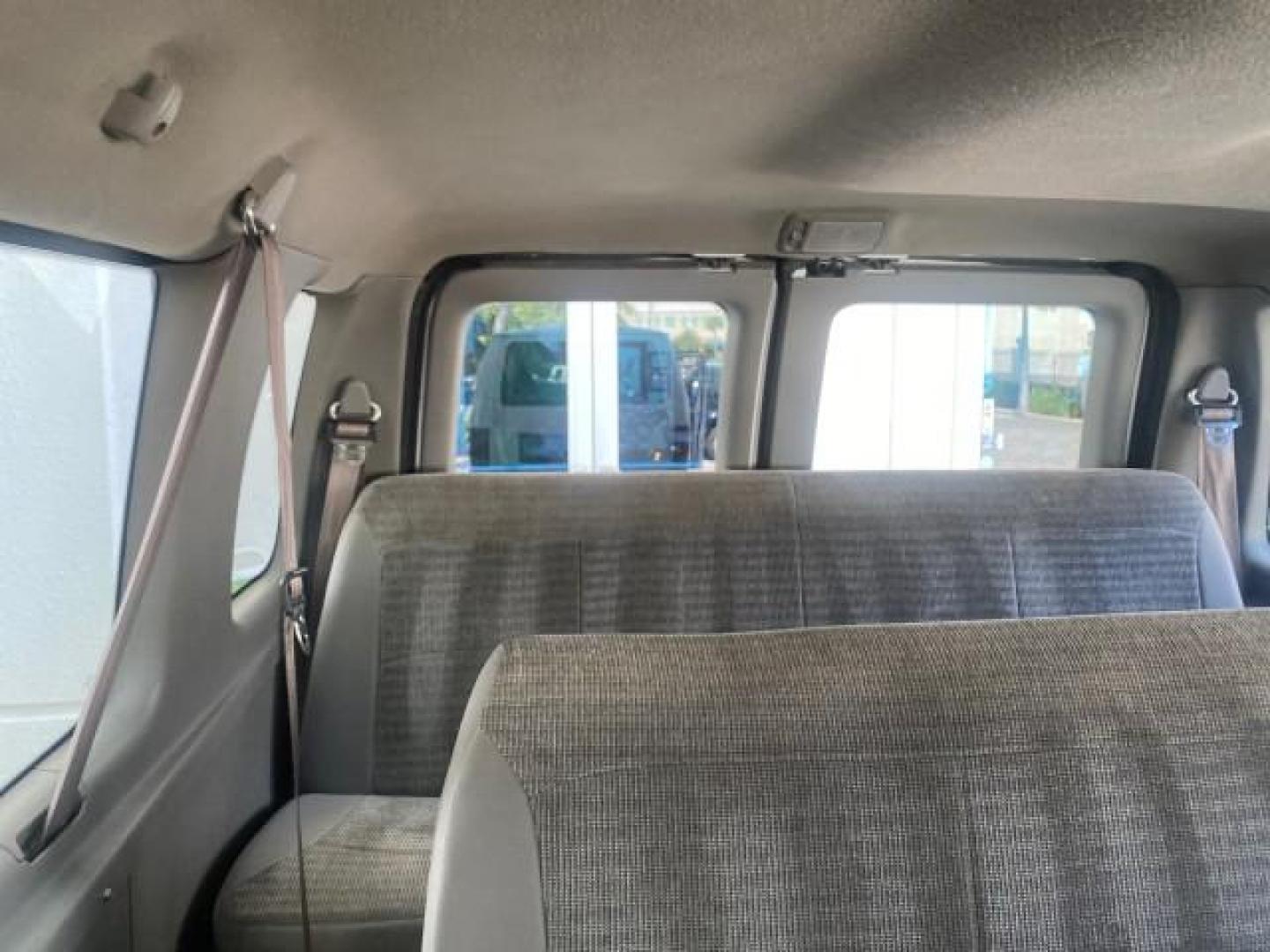 2002 Oxford White /Medium Graphite Ford Econoline Wagon XLT 15 PASSENGER FLORIDA (1FBSS31L32H) with an 5.4L EFI OHC V8 Engine engine, Automatic transmission, located at 4701 North Dixie Hwy, Pompano Beach, FL, 33064, (954) 422-2889, 26.240938, -80.123474 - OUR WEBPAGE FLORIDACARS1.COM HAS OVER 100 PHOTOS AND FREE CARFAX LINK 2002 FORD E-SERIES E-350 SD XLT VIN: 1FBSS31L32HA48789 1 F B S S 3 1 L 3 2 H A 4 8 7 8 9 VAN 5.4L V8 F SOHC 16V GASOLINE REAR WHEEL DRIVE Top Features Cloth Seats Rear Air Conditioning Third Row Seat Tow Hitch Basic Features ABS B - Photo#69