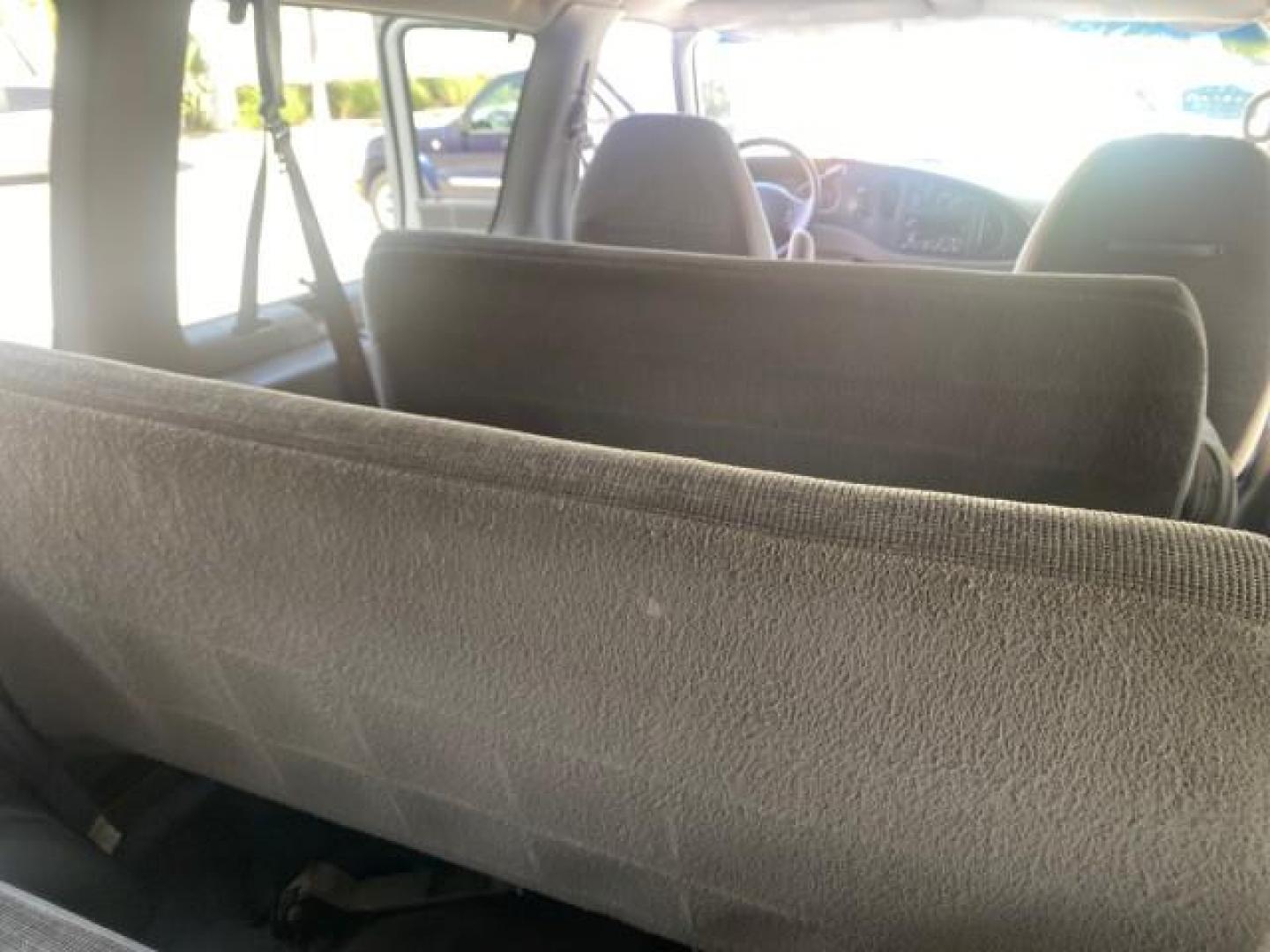 2002 Oxford White /Medium Graphite Ford Econoline Wagon XLT 15 PASSENGER FLORIDA (1FBSS31L32H) with an 5.4L EFI OHC V8 Engine engine, Automatic transmission, located at 4701 North Dixie Hwy, Pompano Beach, FL, 33064, (954) 422-2889, 26.240938, -80.123474 - OUR WEBPAGE FLORIDACARS1.COM HAS OVER 100 PHOTOS AND FREE CARFAX LINK 2002 FORD E-SERIES E-350 SD XLT VIN: 1FBSS31L32HA48789 1 F B S S 3 1 L 3 2 H A 4 8 7 8 9 VAN 5.4L V8 F SOHC 16V GASOLINE REAR WHEEL DRIVE Top Features Cloth Seats Rear Air Conditioning Third Row Seat Tow Hitch Basic Features ABS B - Photo#73