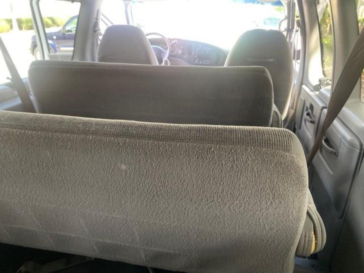 2002 Oxford White /Medium Graphite Ford Econoline Wagon XLT 15 PASSENGER FLORIDA (1FBSS31L32H) with an 5.4L EFI OHC V8 Engine engine, Automatic transmission, located at 4701 North Dixie Hwy, Pompano Beach, FL, 33064, (954) 422-2889, 26.240938, -80.123474 - OUR WEBPAGE FLORIDACARS1.COM HAS OVER 100 PHOTOS AND FREE CARFAX LINK 2002 FORD E-SERIES E-350 SD XLT VIN: 1FBSS31L32HA48789 1 F B S S 3 1 L 3 2 H A 4 8 7 8 9 VAN 5.4L V8 F SOHC 16V GASOLINE REAR WHEEL DRIVE Top Features Cloth Seats Rear Air Conditioning Third Row Seat Tow Hitch Basic Features ABS B - Photo#74