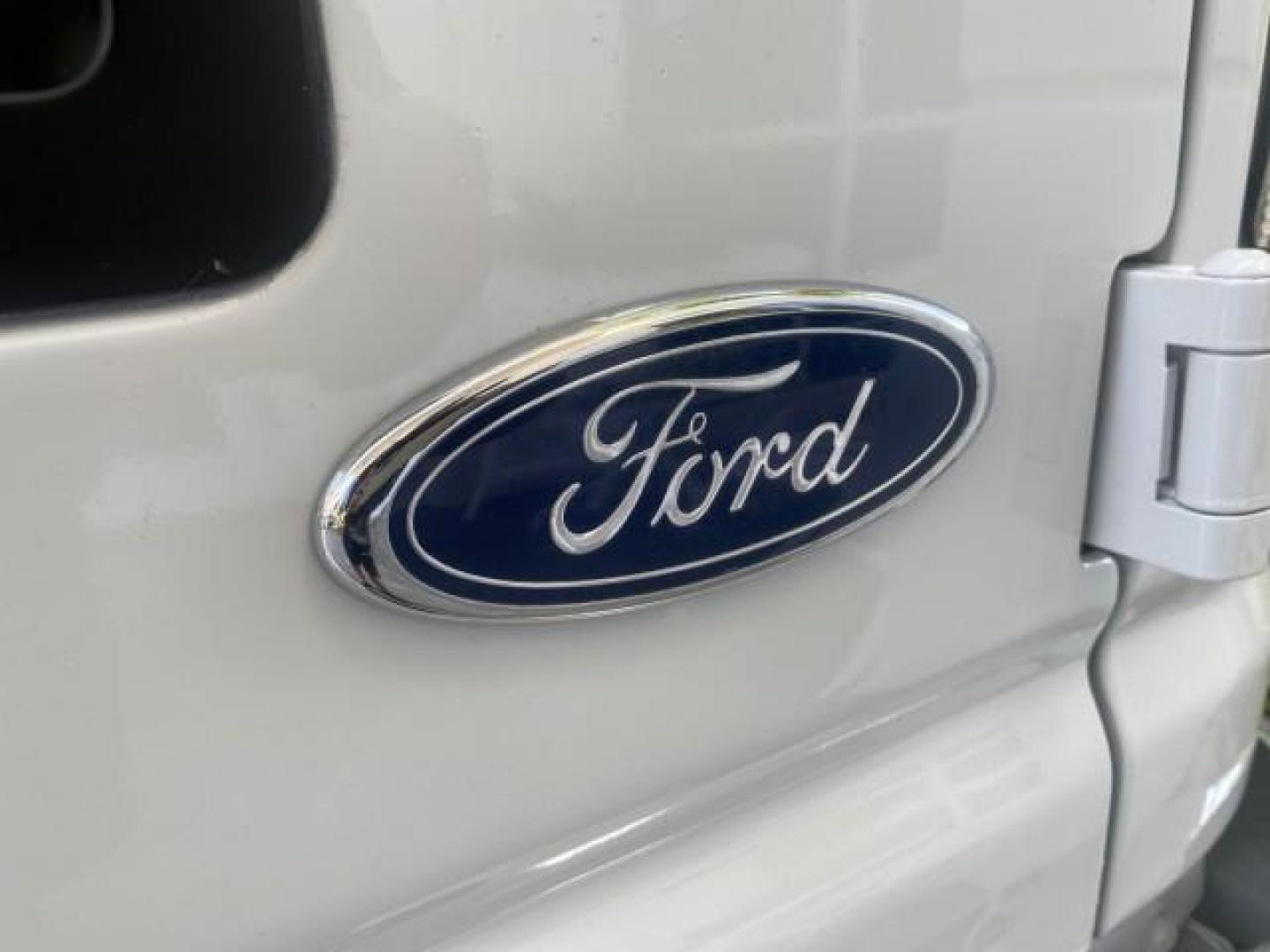 2002 Oxford White /Medium Graphite Ford Econoline Wagon XLT 15 PASSENGER FLORIDA (1FBSS31L32H) with an 5.4L EFI OHC V8 Engine engine, Automatic transmission, located at 4701 North Dixie Hwy, Pompano Beach, FL, 33064, (954) 422-2889, 26.240938, -80.123474 - OUR WEBPAGE FLORIDACARS1.COM HAS OVER 100 PHOTOS AND FREE CARFAX LINK 2002 FORD E-SERIES E-350 SD XLT VIN: 1FBSS31L32HA48789 1 F B S S 3 1 L 3 2 H A 4 8 7 8 9 VAN 5.4L V8 F SOHC 16V GASOLINE REAR WHEEL DRIVE Top Features Cloth Seats Rear Air Conditioning Third Row Seat Tow Hitch Basic Features ABS B - Photo#85