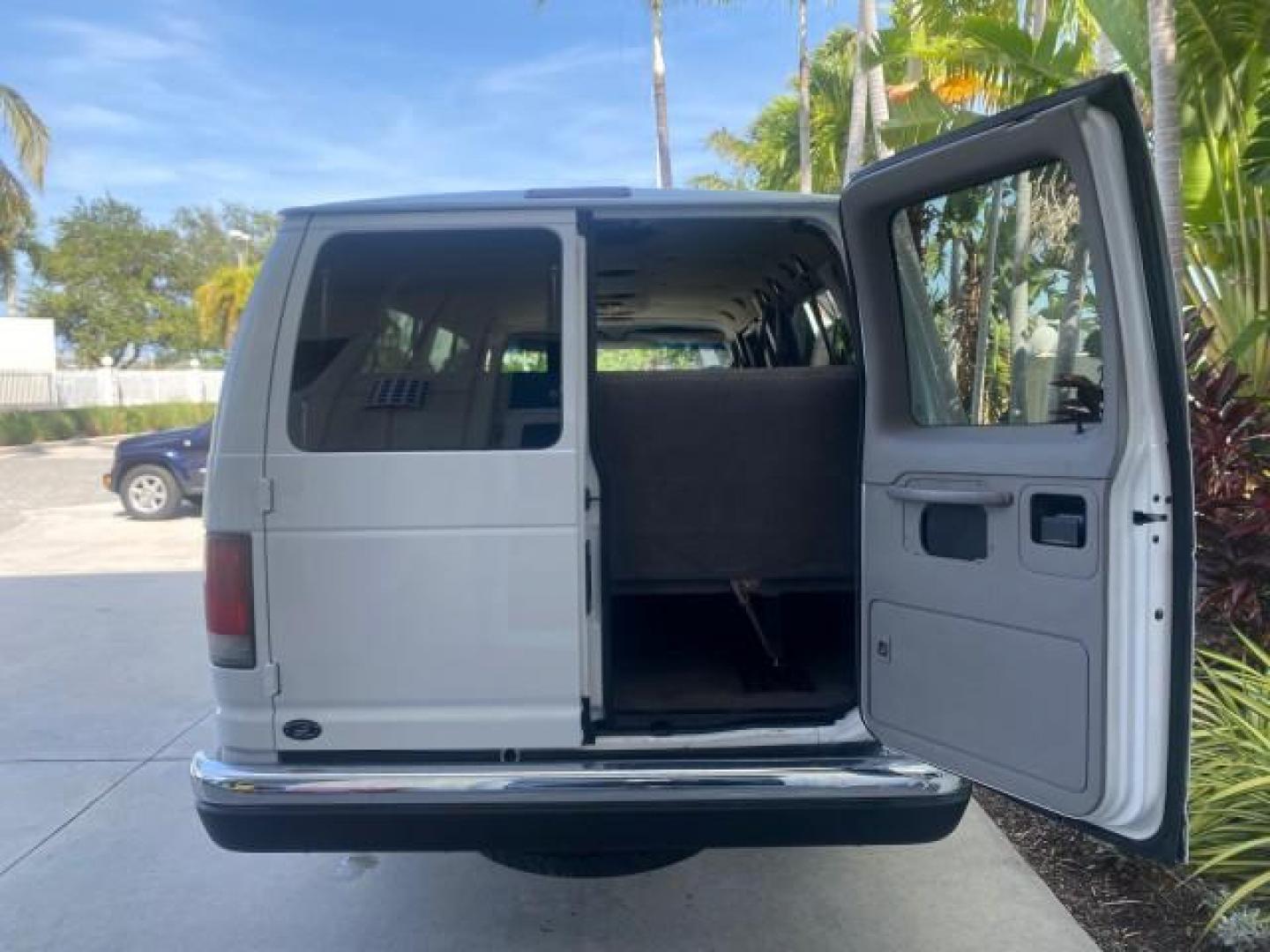 2002 Oxford White /Medium Graphite Ford Econoline Wagon XLT 15 PASSENGER FLORIDA (1FBSS31L32H) with an 5.4L EFI OHC V8 Engine engine, Automatic transmission, located at 4701 North Dixie Hwy, Pompano Beach, FL, 33064, (954) 422-2889, 26.240938, -80.123474 - OUR WEBPAGE FLORIDACARS1.COM HAS OVER 100 PHOTOS AND FREE CARFAX LINK 2002 FORD E-SERIES E-350 SD XLT VIN: 1FBSS31L32HA48789 1 F B S S 3 1 L 3 2 H A 4 8 7 8 9 VAN 5.4L V8 F SOHC 16V GASOLINE REAR WHEEL DRIVE Top Features Cloth Seats Rear Air Conditioning Third Row Seat Tow Hitch Basic Features ABS B - Photo#87