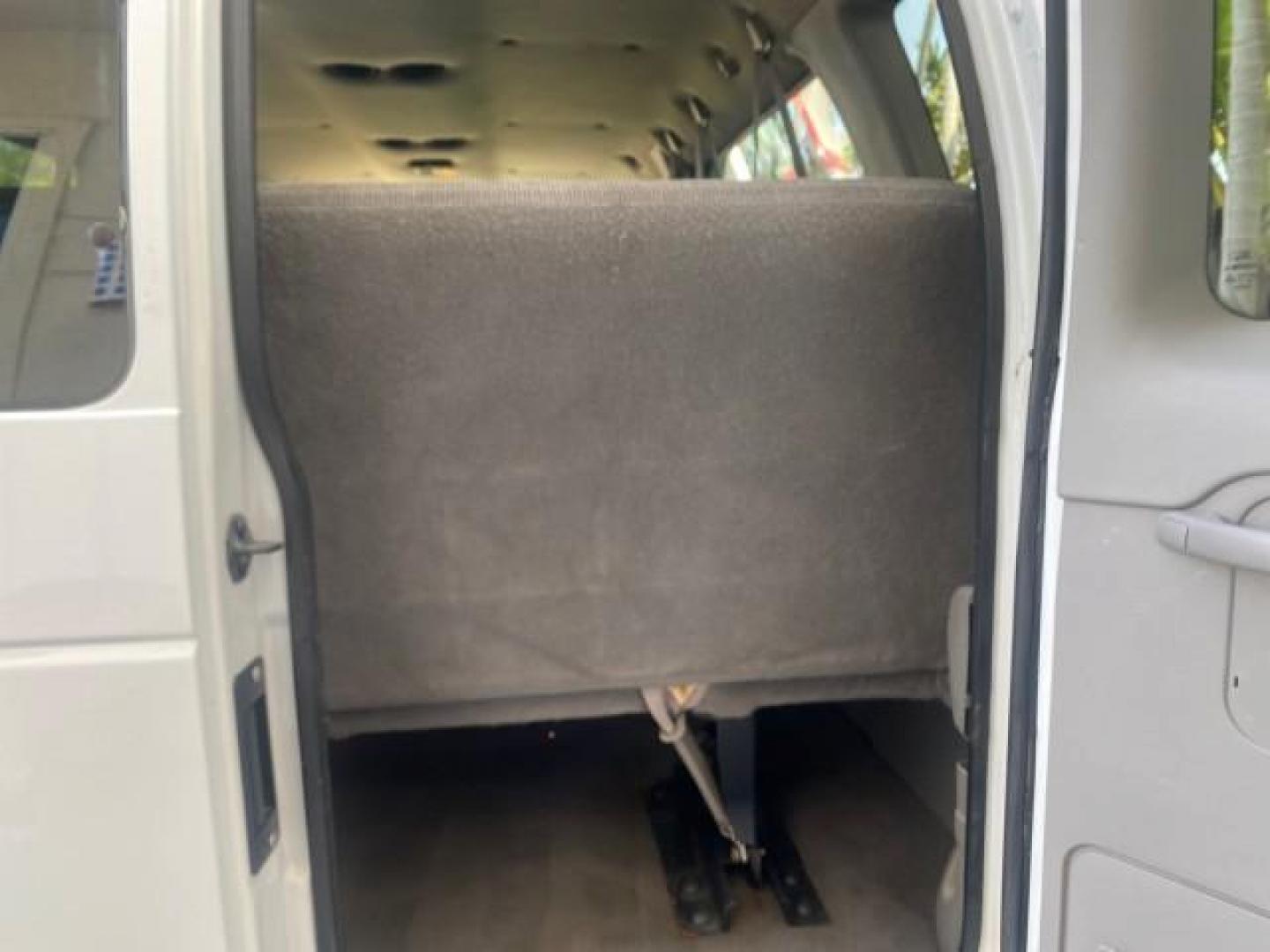 2002 Oxford White /Medium Graphite Ford Econoline Wagon XLT 15 PASSENGER FLORIDA (1FBSS31L32H) with an 5.4L EFI OHC V8 Engine engine, Automatic transmission, located at 4701 North Dixie Hwy, Pompano Beach, FL, 33064, (954) 422-2889, 26.240938, -80.123474 - OUR WEBPAGE FLORIDACARS1.COM HAS OVER 100 PHOTOS AND FREE CARFAX LINK 2002 FORD E-SERIES E-350 SD XLT VIN: 1FBSS31L32HA48789 1 F B S S 3 1 L 3 2 H A 4 8 7 8 9 VAN 5.4L V8 F SOHC 16V GASOLINE REAR WHEEL DRIVE Top Features Cloth Seats Rear Air Conditioning Third Row Seat Tow Hitch Basic Features ABS B - Photo#89