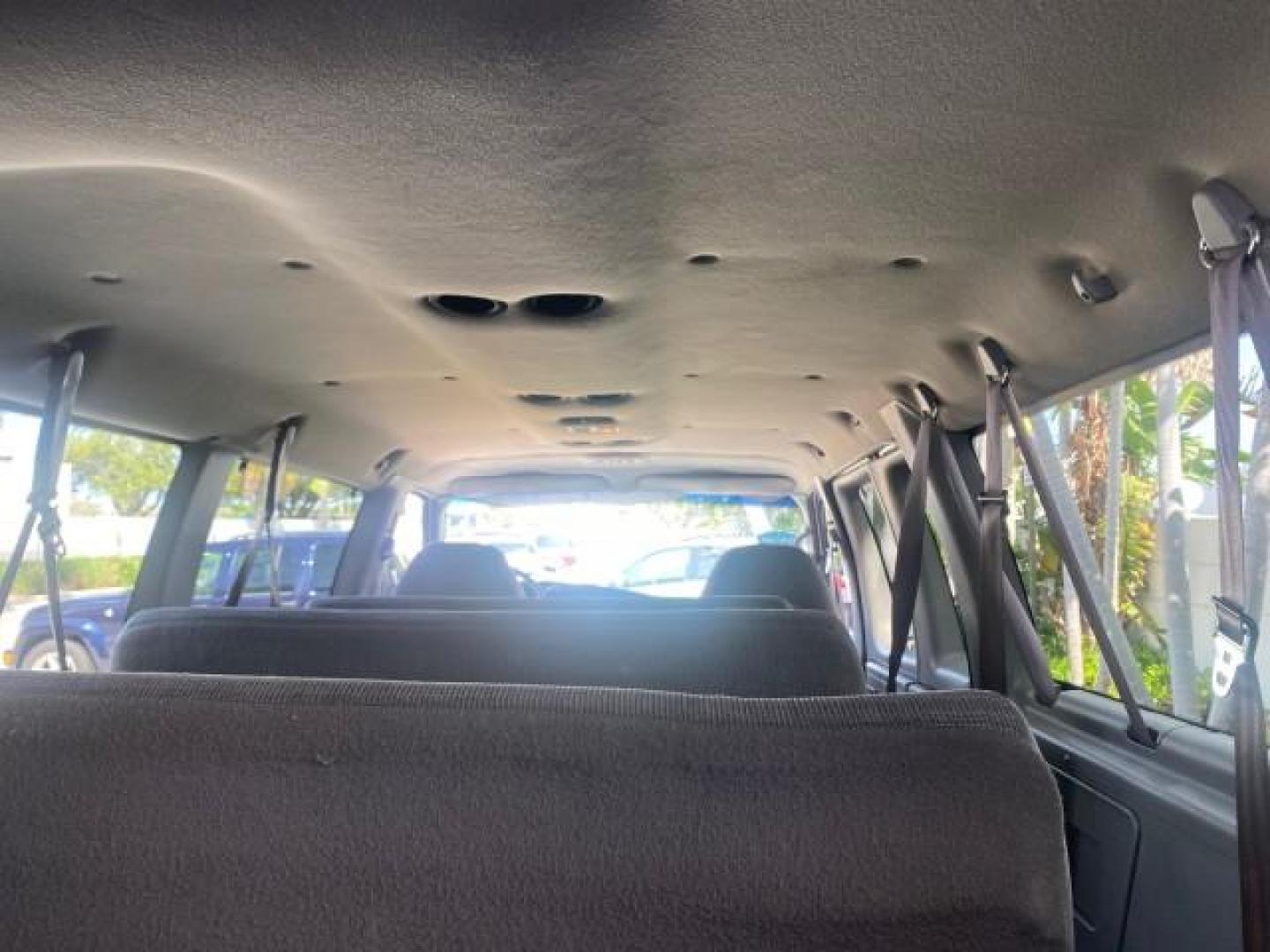 2002 Oxford White /Medium Graphite Ford Econoline Wagon XLT 15 PASSENGER FLORIDA (1FBSS31L32H) with an 5.4L EFI OHC V8 Engine engine, Automatic transmission, located at 4701 North Dixie Hwy, Pompano Beach, FL, 33064, (954) 422-2889, 26.240938, -80.123474 - OUR WEBPAGE FLORIDACARS1.COM HAS OVER 100 PHOTOS AND FREE CARFAX LINK 2002 FORD E-SERIES E-350 SD XLT VIN: 1FBSS31L32HA48789 1 F B S S 3 1 L 3 2 H A 4 8 7 8 9 VAN 5.4L V8 F SOHC 16V GASOLINE REAR WHEEL DRIVE Top Features Cloth Seats Rear Air Conditioning Third Row Seat Tow Hitch Basic Features ABS B - Photo#90