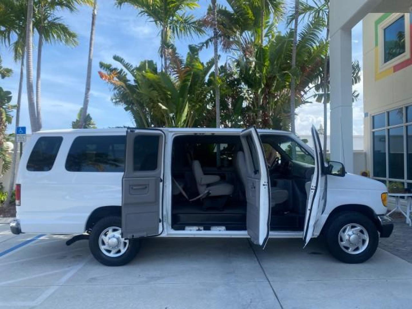 2002 Oxford White /Medium Graphite Ford Econoline Wagon XLT 15 PASSENGER FLORIDA (1FBSS31L32H) with an 5.4L EFI OHC V8 Engine engine, Automatic transmission, located at 4701 North Dixie Hwy, Pompano Beach, FL, 33064, (954) 422-2889, 26.240938, -80.123474 - OUR WEBPAGE FLORIDACARS1.COM HAS OVER 100 PHOTOS AND FREE CARFAX LINK 2002 FORD E-SERIES E-350 SD XLT VIN: 1FBSS31L32HA48789 1 F B S S 3 1 L 3 2 H A 4 8 7 8 9 VAN 5.4L V8 F SOHC 16V GASOLINE REAR WHEEL DRIVE Top Features Cloth Seats Rear Air Conditioning Third Row Seat Tow Hitch Basic Features ABS B - Photo#92