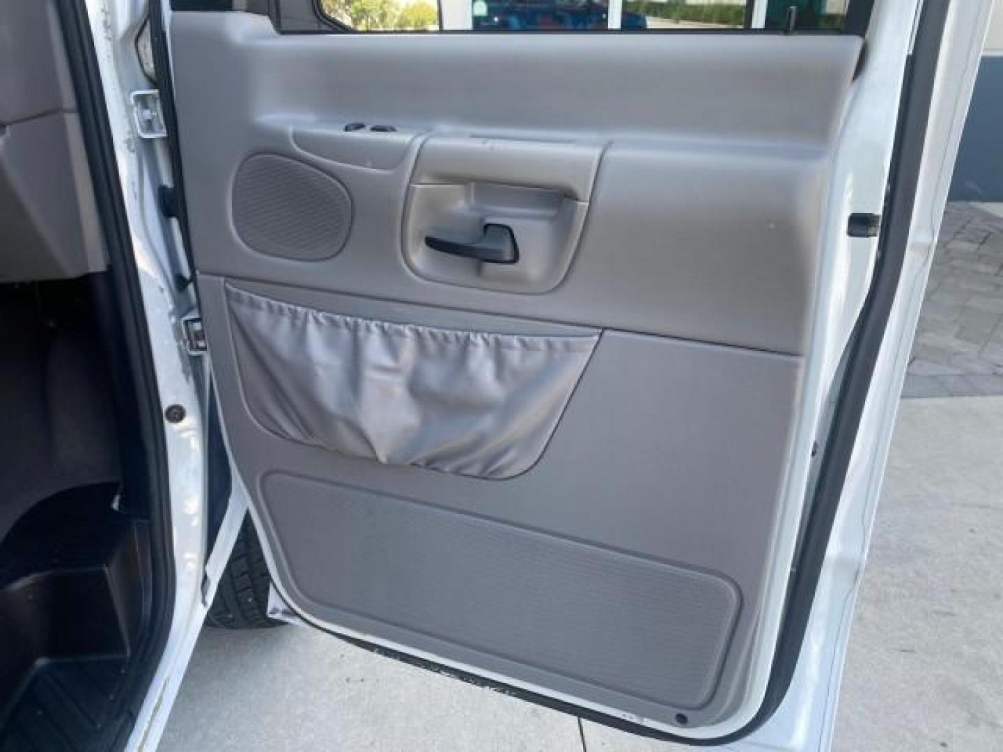 2002 Oxford White /Medium Graphite Ford Econoline Wagon XLT 15 PASSENGER FLORIDA (1FBSS31L32H) with an 5.4L EFI OHC V8 Engine engine, Automatic transmission, located at 4701 North Dixie Hwy, Pompano Beach, FL, 33064, (954) 422-2889, 26.240938, -80.123474 - OUR WEBPAGE FLORIDACARS1.COM HAS OVER 100 PHOTOS AND FREE CARFAX LINK 2002 FORD E-SERIES E-350 SD XLT VIN: 1FBSS31L32HA48789 1 F B S S 3 1 L 3 2 H A 4 8 7 8 9 VAN 5.4L V8 F SOHC 16V GASOLINE REAR WHEEL DRIVE Top Features Cloth Seats Rear Air Conditioning Third Row Seat Tow Hitch Basic Features ABS B - Photo#97