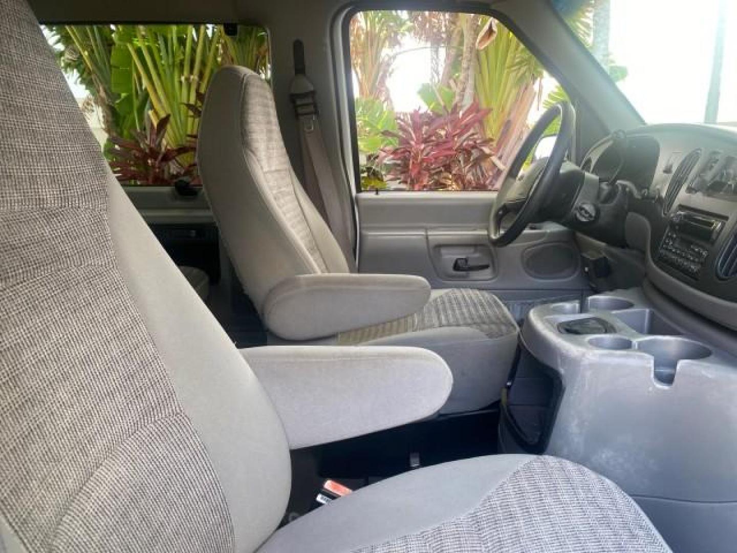 2002 Oxford White /Medium Graphite Ford Econoline Wagon XLT 15 PASSENGER FLORIDA (1FBSS31L32H) with an 5.4L EFI OHC V8 Engine engine, Automatic transmission, located at 4701 North Dixie Hwy, Pompano Beach, FL, 33064, (954) 422-2889, 26.240938, -80.123474 - OUR WEBPAGE FLORIDACARS1.COM HAS OVER 100 PHOTOS AND FREE CARFAX LINK 2002 FORD E-SERIES E-350 SD XLT VIN: 1FBSS31L32HA48789 1 F B S S 3 1 L 3 2 H A 4 8 7 8 9 VAN 5.4L V8 F SOHC 16V GASOLINE REAR WHEEL DRIVE Top Features Cloth Seats Rear Air Conditioning Third Row Seat Tow Hitch Basic Features ABS B - Photo#98