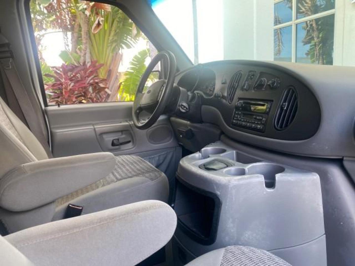 2002 Oxford White /Medium Graphite Ford Econoline Wagon XLT 15 PASSENGER FLORIDA (1FBSS31L32H) with an 5.4L EFI OHC V8 Engine engine, Automatic transmission, located at 4701 North Dixie Hwy, Pompano Beach, FL, 33064, (954) 422-2889, 26.240938, -80.123474 - OUR WEBPAGE FLORIDACARS1.COM HAS OVER 100 PHOTOS AND FREE CARFAX LINK 2002 FORD E-SERIES E-350 SD XLT VIN: 1FBSS31L32HA48789 1 F B S S 3 1 L 3 2 H A 4 8 7 8 9 VAN 5.4L V8 F SOHC 16V GASOLINE REAR WHEEL DRIVE Top Features Cloth Seats Rear Air Conditioning Third Row Seat Tow Hitch Basic Features ABS B - Photo#99