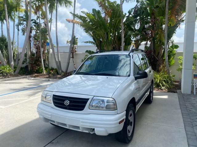 2001 Bright White /Gray Suzuki Vitara JLS LOW 35,130 1 OWNER (2S3TE52V716) with an 2.0L DOHC MPFI 16-Valve 4-Cyl Engine engine, Automatic transmission, located at 4701 North Dixie Hwy, Pompano Beach, FL, 33064, (954) 422-2889, 26.240938, -80.123474 - OUR WEBPAGE FLORIDACARS1.COM HAS OVER 100 PHOTOS AND FREE CARFAX LINK 2001 SUZUKI VITARA JLS VIN: 2S3TE52V716105780 2 S 3 T E 5 2 V 7 1 6 1 0 5 7 8 0 4 DOOR WAGON/SPORT UTILITY 2.0L I4 F DOHC 16V GASOLINE REAR WHEEL DRIVE Top Features Cloth Seats Soft Top Basic Features AM/FM Stereo Air Conditioning - Photo#3