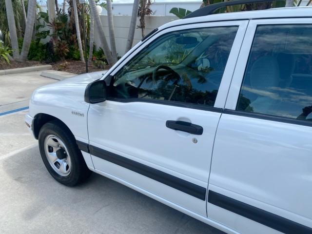 2001 Bright White /Gray Suzuki Vitara JLS LOW 35,130 1 OWNER (2S3TE52V716) with an 2.0L DOHC MPFI 16-Valve 4-Cyl Engine engine, Automatic transmission, located at 4701 North Dixie Hwy, Pompano Beach, FL, 33064, (954) 422-2889, 26.240938, -80.123474 - OUR WEBPAGE FLORIDACARS1.COM HAS OVER 100 PHOTOS AND FREE CARFAX LINK 2001 SUZUKI VITARA JLS VIN: 2S3TE52V716105780 2 S 3 T E 5 2 V 7 1 6 1 0 5 7 8 0 4 DOOR WAGON/SPORT UTILITY 2.0L I4 F DOHC 16V GASOLINE REAR WHEEL DRIVE Top Features Cloth Seats Soft Top Basic Features AM/FM Stereo Air Conditioning - Photo#26