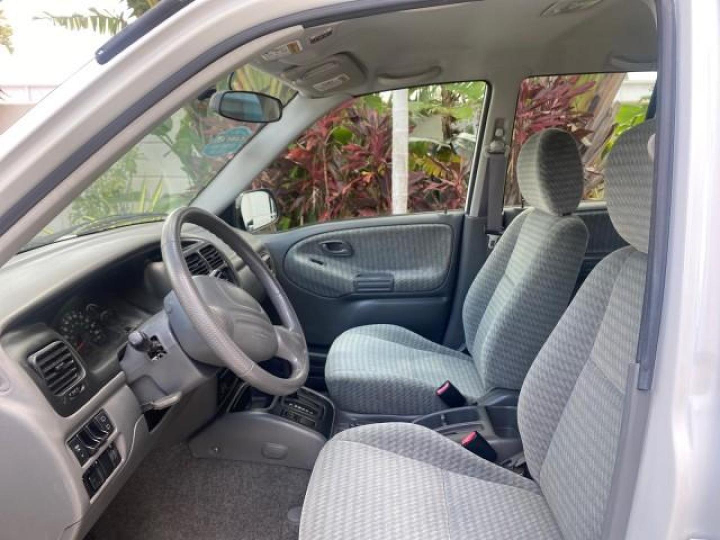 2001 Bright White /Gray Suzuki Vitara JLS LOW 35,130 1 OWNER (2S3TE52V716) with an 2.0L DOHC MPFI 16-Valve 4-Cyl Engine engine, Automatic transmission, located at 4701 North Dixie Hwy, Pompano Beach, FL, 33064, (954) 422-2889, 26.240938, -80.123474 - OUR WEBPAGE FLORIDACARS1.COM HAS OVER 100 PHOTOS AND FREE CARFAX LINK 2001 SUZUKI VITARA JLS VIN: 2S3TE52V716105780 2 S 3 T E 5 2 V 7 1 6 1 0 5 7 8 0 4 DOOR WAGON/SPORT UTILITY 2.0L I4 F DOHC 16V GASOLINE REAR WHEEL DRIVE Top Features Cloth Seats Soft Top Basic Features AM/FM Stereo Air Conditioning - Photo#34