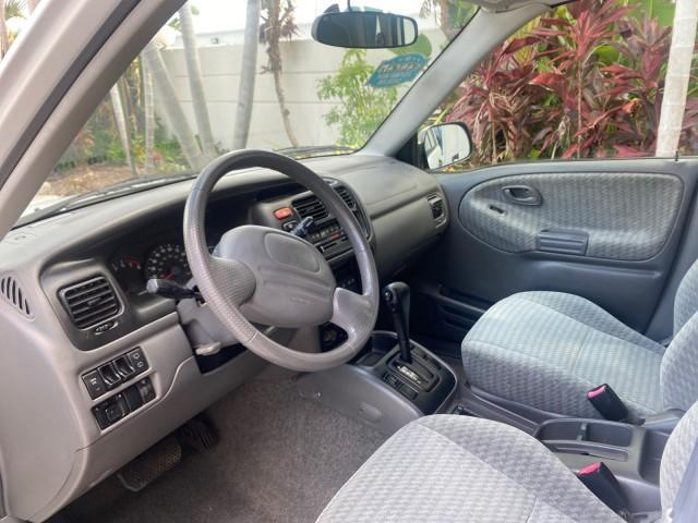 2001 Bright White /Gray Suzuki Vitara JLS LOW 35,130 1 OWNER (2S3TE52V716) with an 2.0L DOHC MPFI 16-Valve 4-Cyl Engine engine, Automatic transmission, located at 4701 North Dixie Hwy, Pompano Beach, FL, 33064, (954) 422-2889, 26.240938, -80.123474 - OUR WEBPAGE FLORIDACARS1.COM HAS OVER 100 PHOTOS AND FREE CARFAX LINK 2001 SUZUKI VITARA JLS VIN: 2S3TE52V716105780 2 S 3 T E 5 2 V 7 1 6 1 0 5 7 8 0 4 DOOR WAGON/SPORT UTILITY 2.0L I4 F DOHC 16V GASOLINE REAR WHEEL DRIVE Top Features Cloth Seats Soft Top Basic Features AM/FM Stereo Air Conditioning - Photo#35